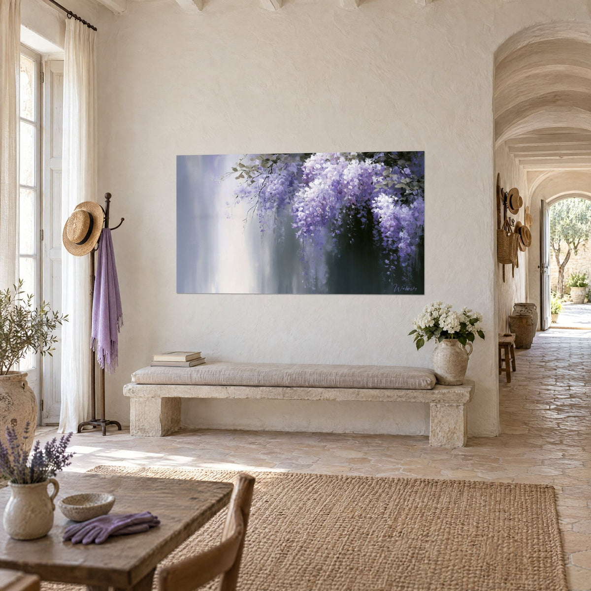 Wall art cascading violet and white flowers on a grey-green sheen, hung above a stone bench in a Provençal farmhouse