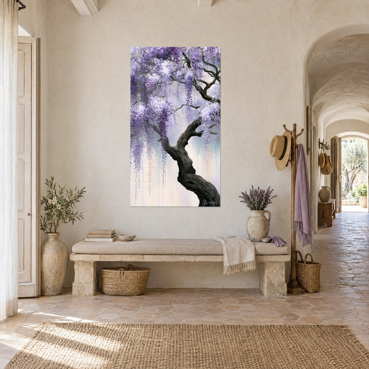 Wall art winding brown bark trunk beneath cascades of lilac and white blooms, cream wall of a Provençal farmhouse, three-quarter view