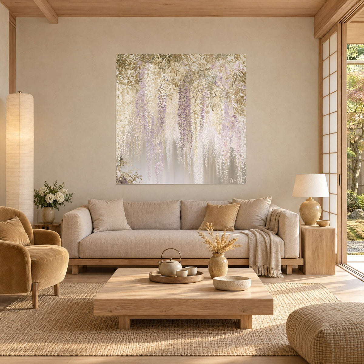 Wall art wisteria in ivory and pale mauve clusters beneath golden foliage, above a sofa in a bright living room