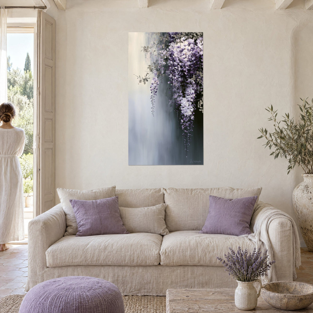Wall art purple wisteria with drooping clusters on pearl grey background, hung above a sofa in a bright living room