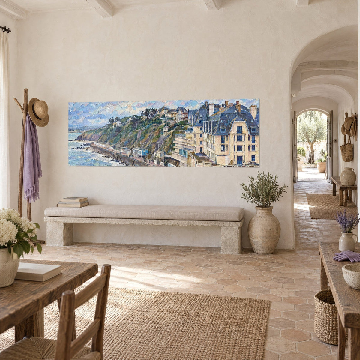 Wall art of cream villas with blue-grey slate roofs perched on the cliff, turquoise foaming sea, three-quarter view in a Provençal farmhouse