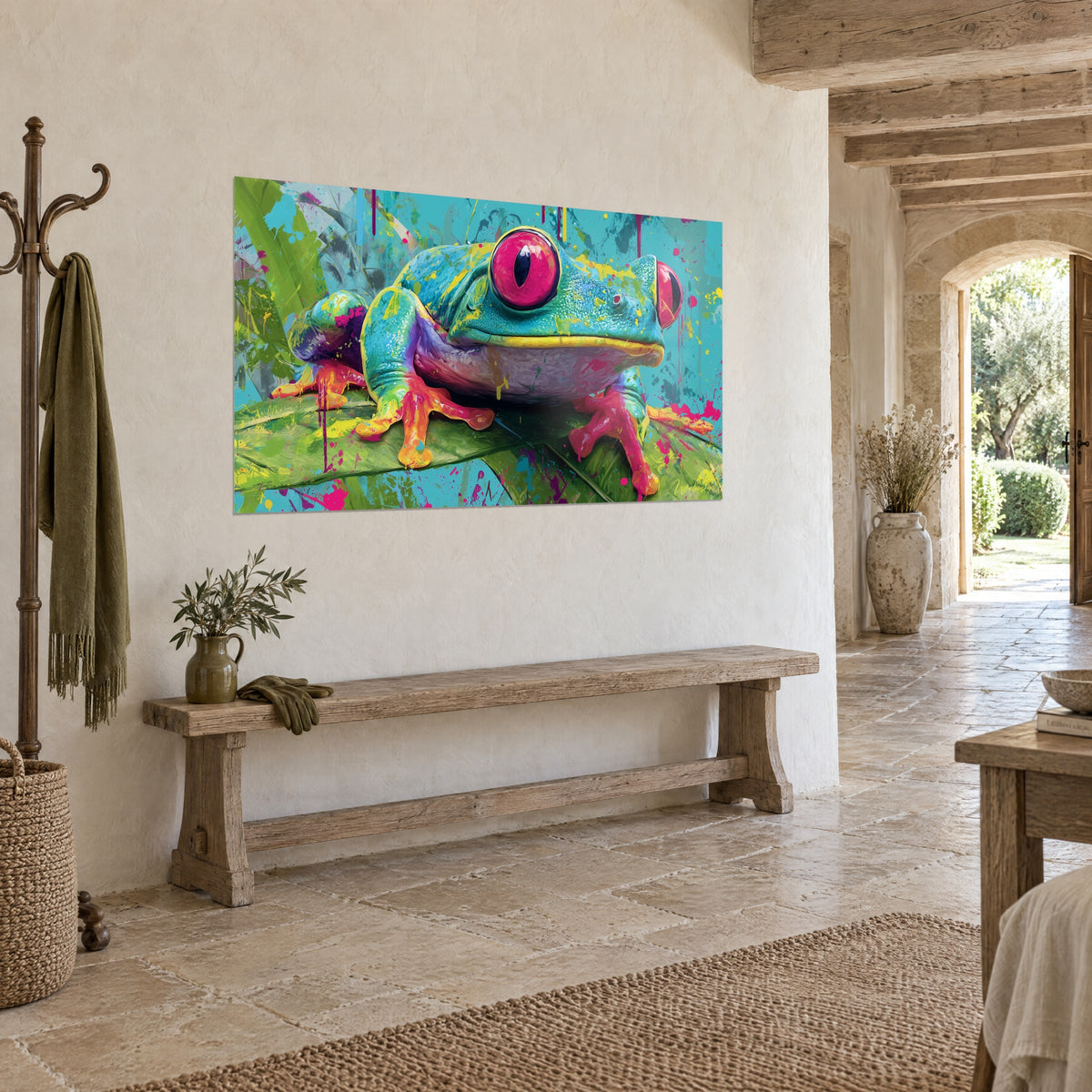Tableau batracien turquoise perché sur une feuille verte, pattes orange et yeux magenta, sur un mur crépi d'une maison en pierre