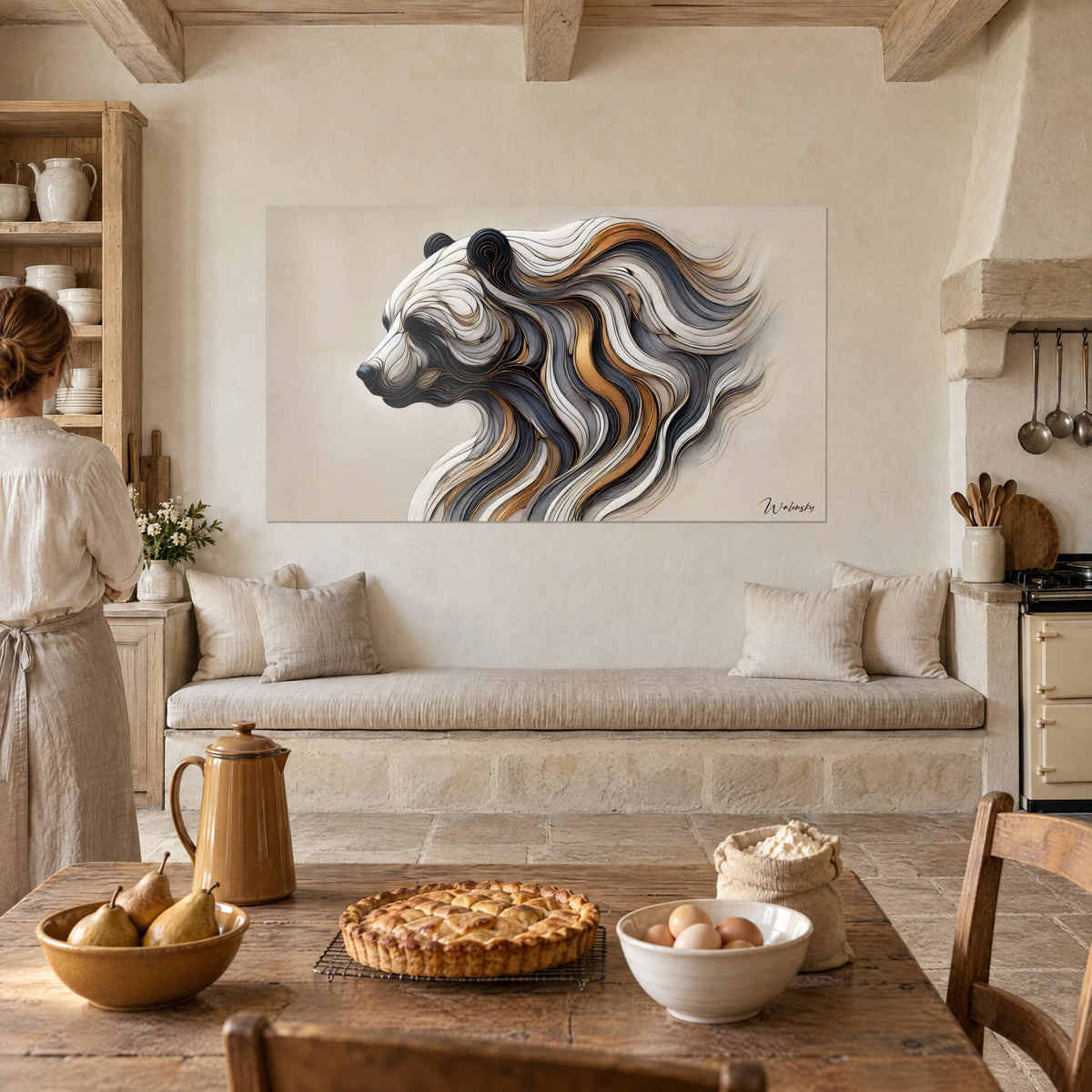 Wall art animal portrait in white and golden slats, black muzzle turned to the left, woman seen from behind beside a tart, rustic kitchen