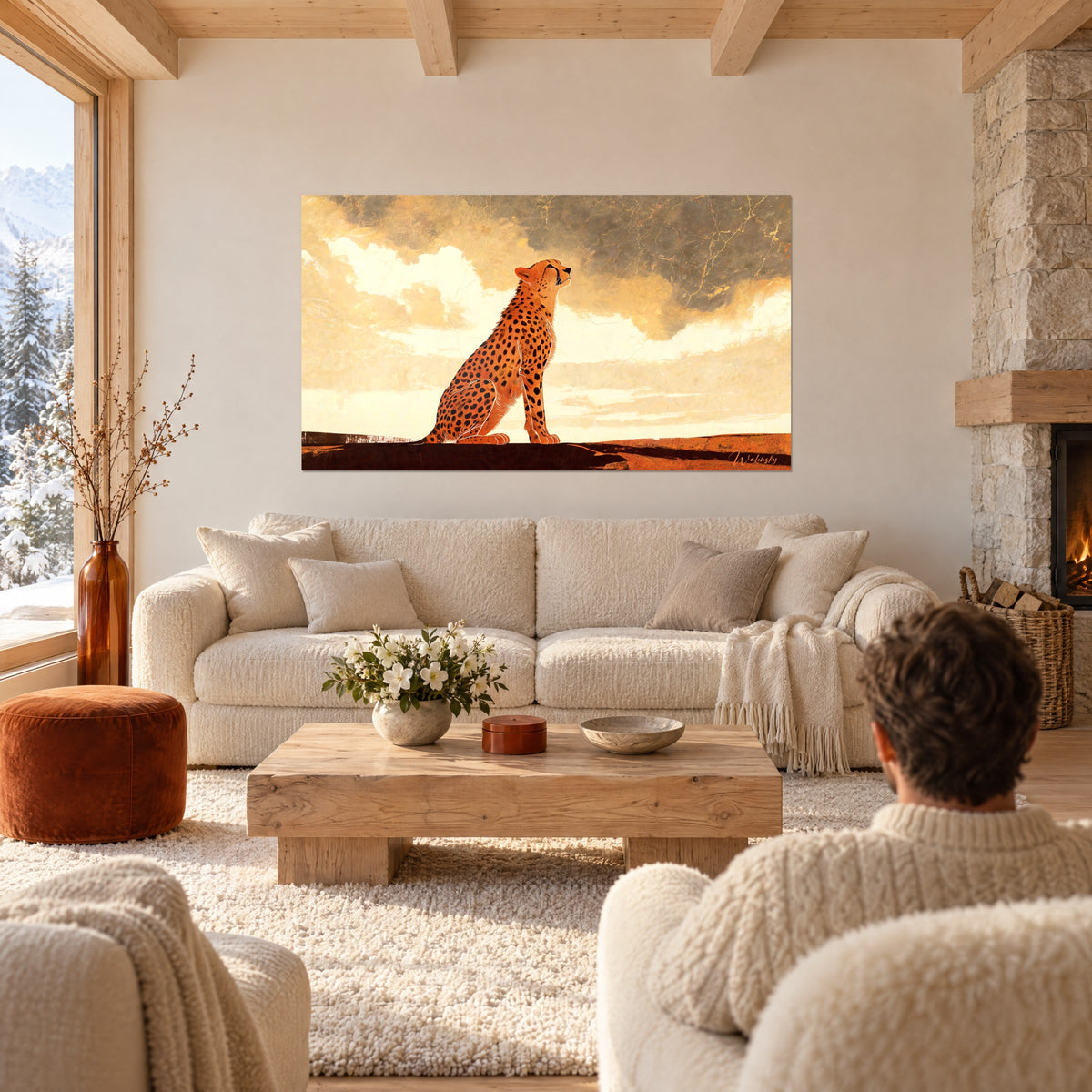 Wall art black-spotted cheetah sitting with its muzzle raised toward an ivory and charcoal sky, above a sofa in a bright living room