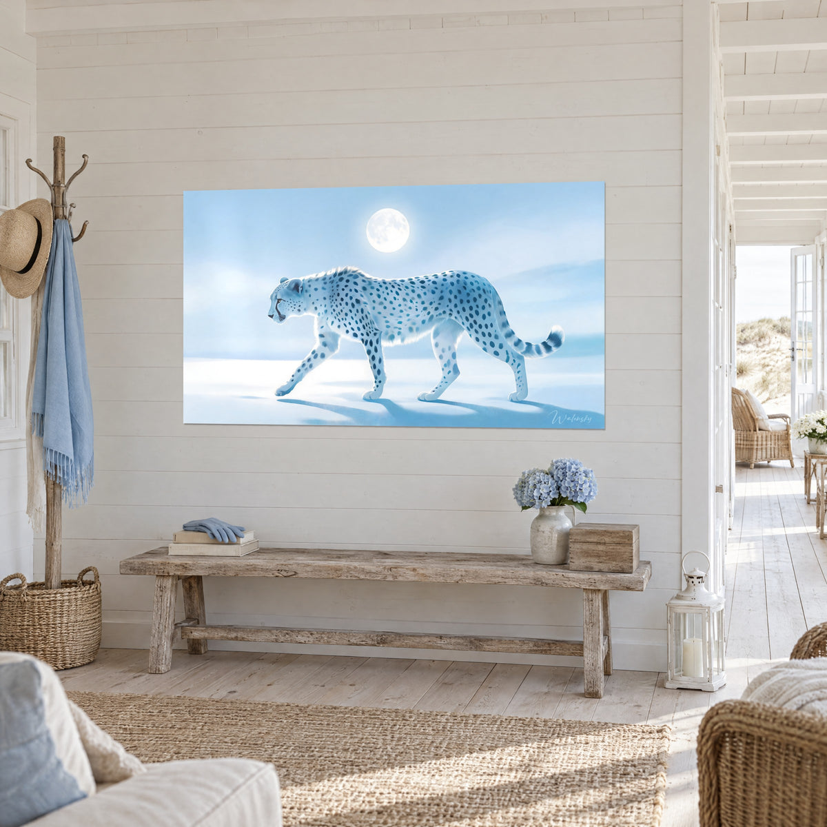 Wall art slate-blue spotted wildcat walking on snow, clear azure sky, three-quarter view in a beach house