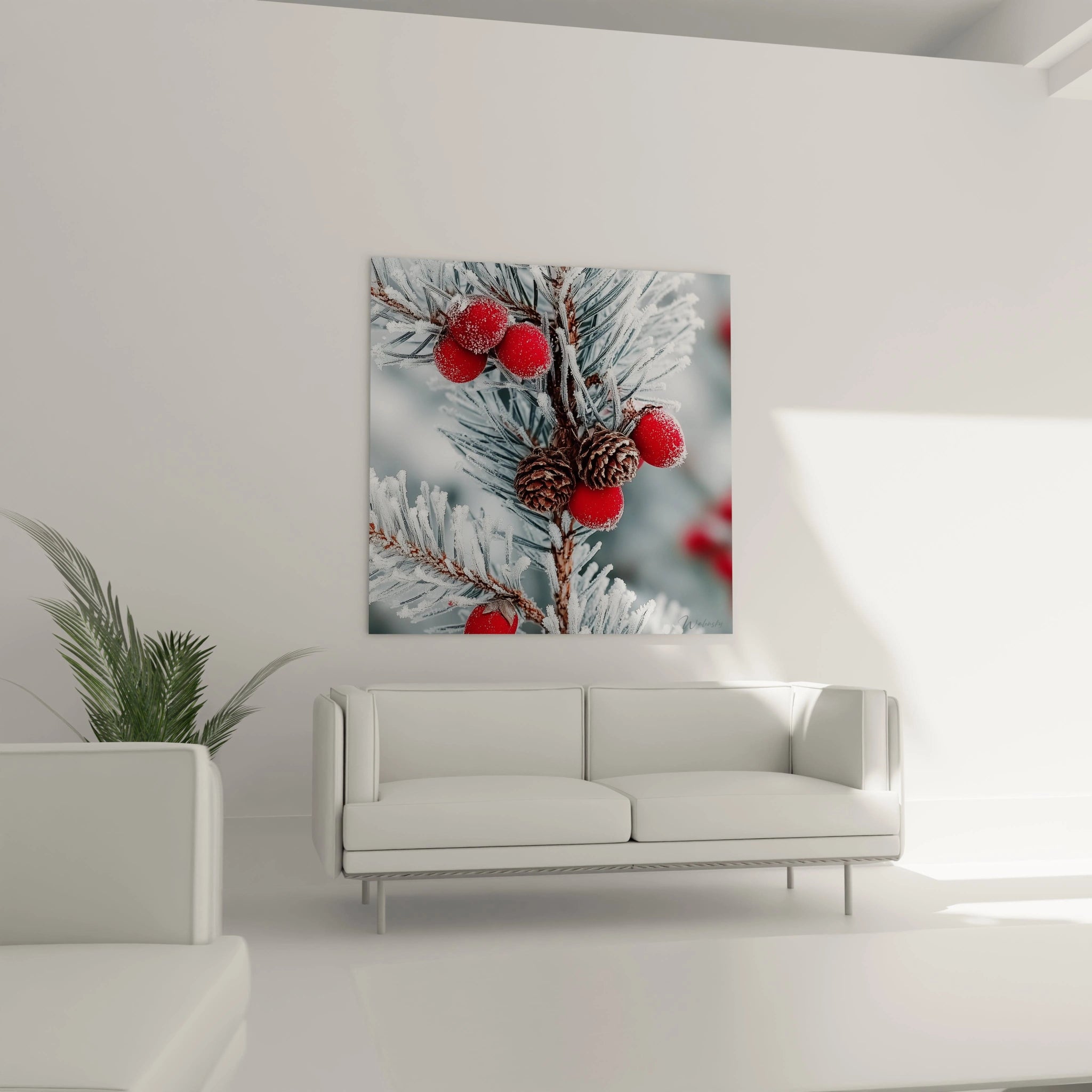 Tableau déco hivernal montrant des baies rouges et des branches de pin couvertes de neige
