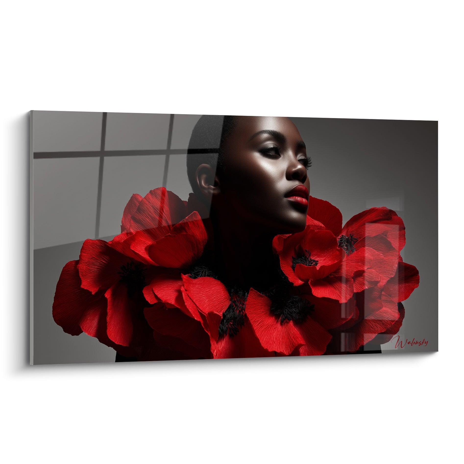 Visage serein encerclé de pétales rouge vif sur fond anthracite, lumière douce et latérale