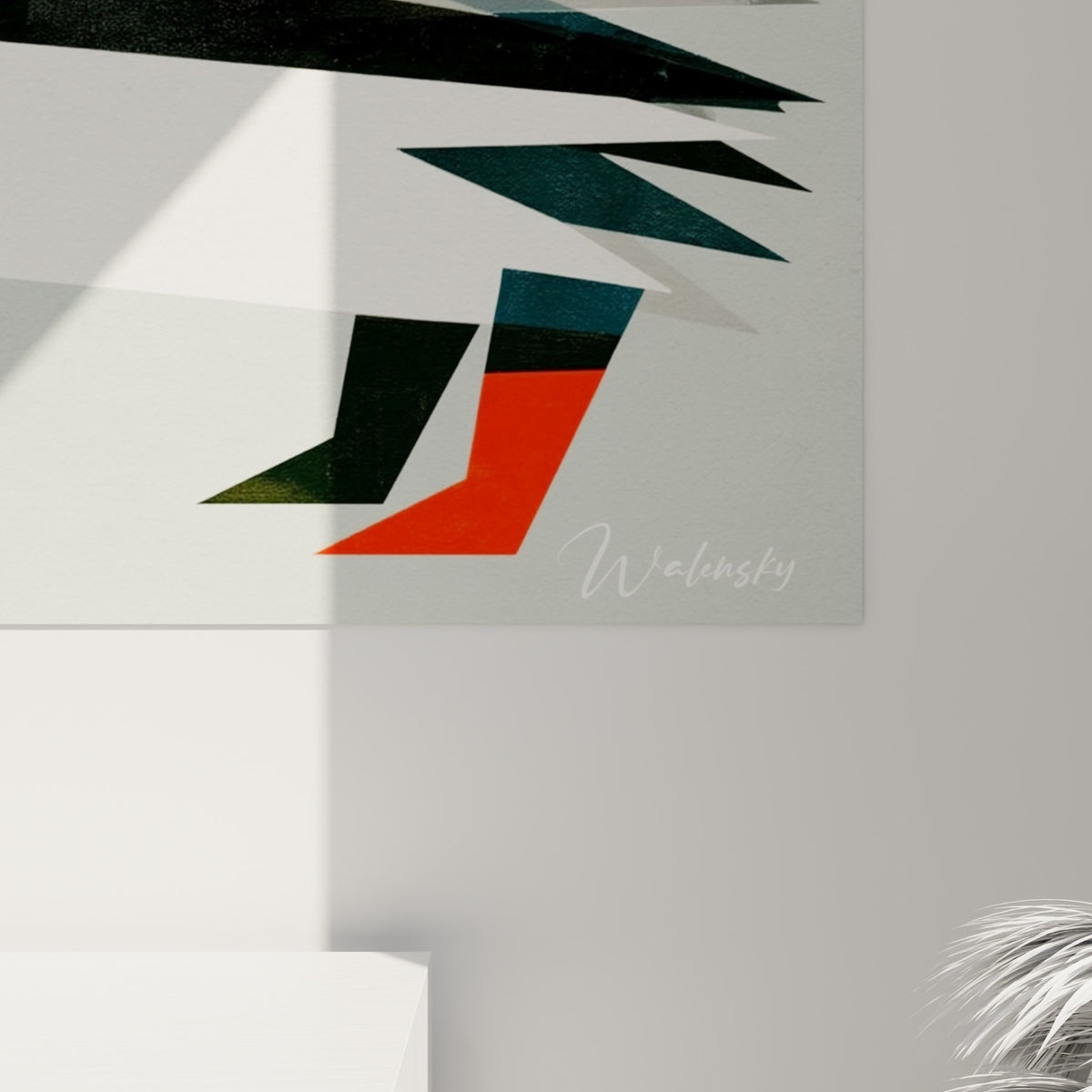 Détail des formes triangulaires anthracite, bleu pétrole et orange vif du hérisson, matière imprimée visible de près