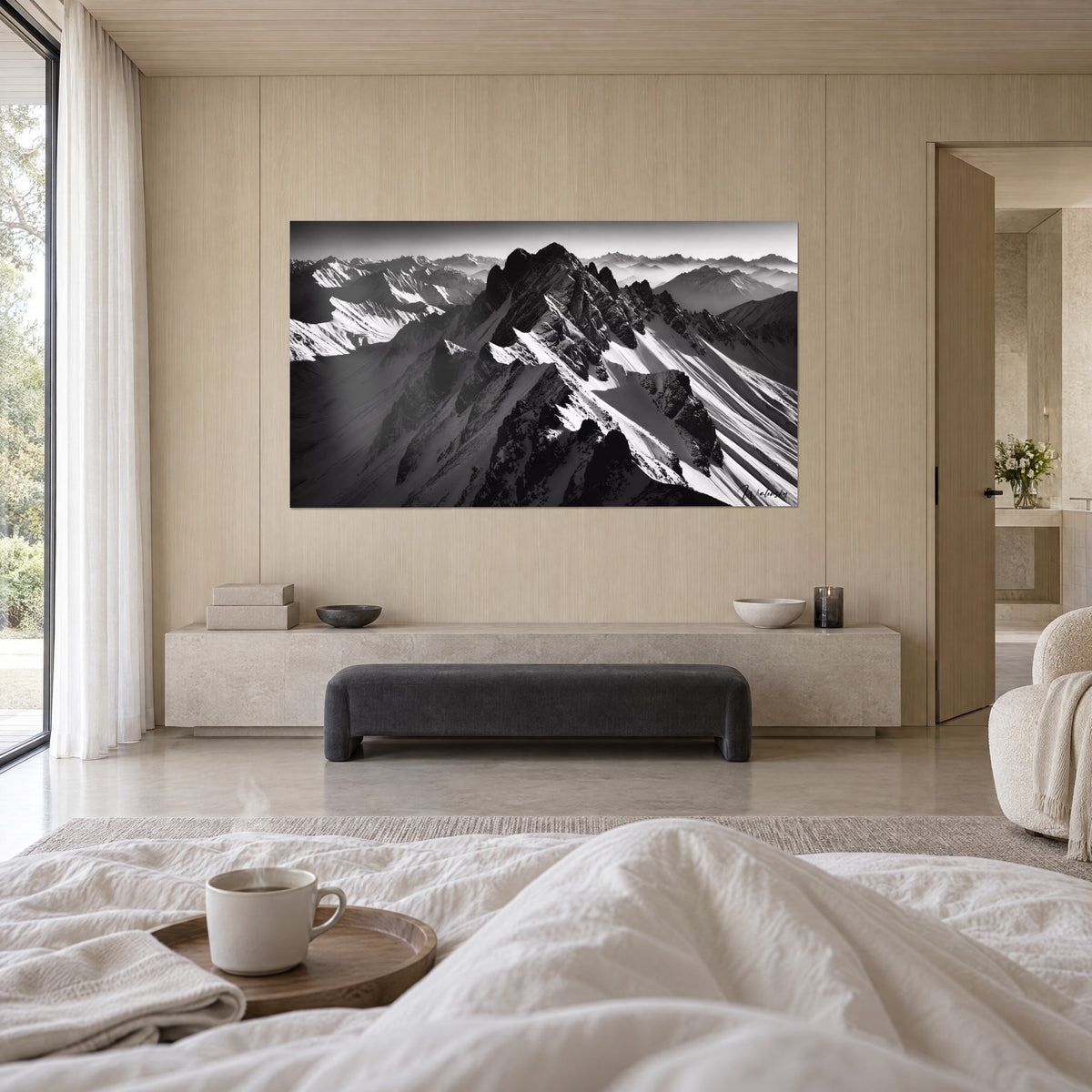 Wall art frosted mountain massif, white slopes streaked with black shadows, couple seen from behind, above a bed in a light bedroom