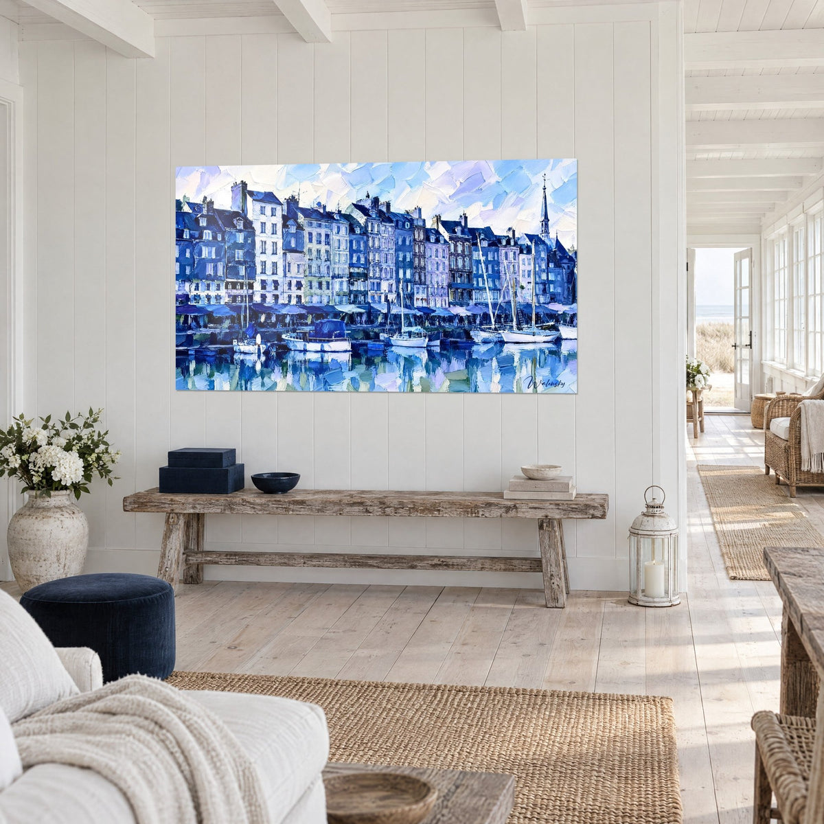 Wall art Normandy harbour with narrow houses in midnight blue and cream white, moored sailing boats, faceted sky, on a white wall of a seaside house