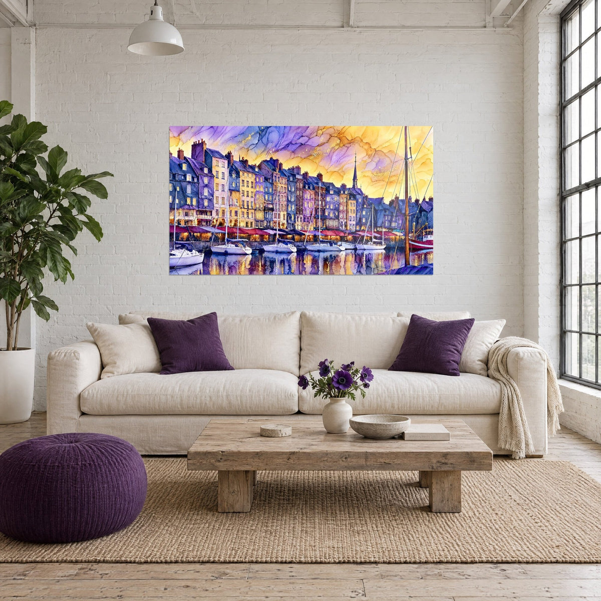 Wall art watercolour of the Honfleur harbour, purple and ochre facades, marbled golden sky, white sailboats, above a sofa in a bright living room