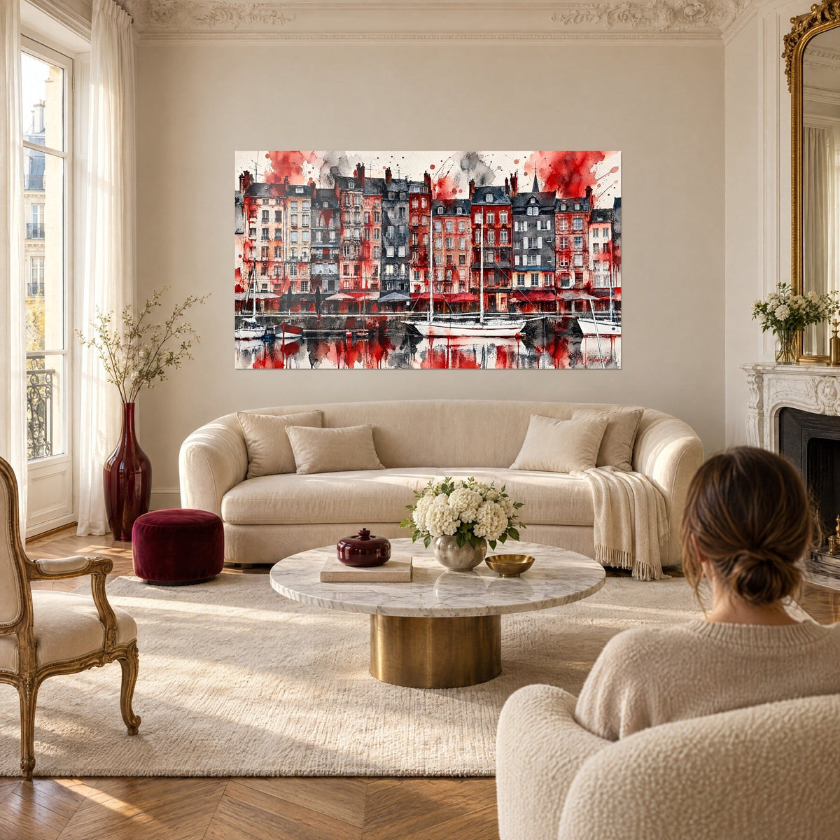 Wall art white sailboat in front of red and grey facades, scarlet splashes, above a sofa in a bright living room