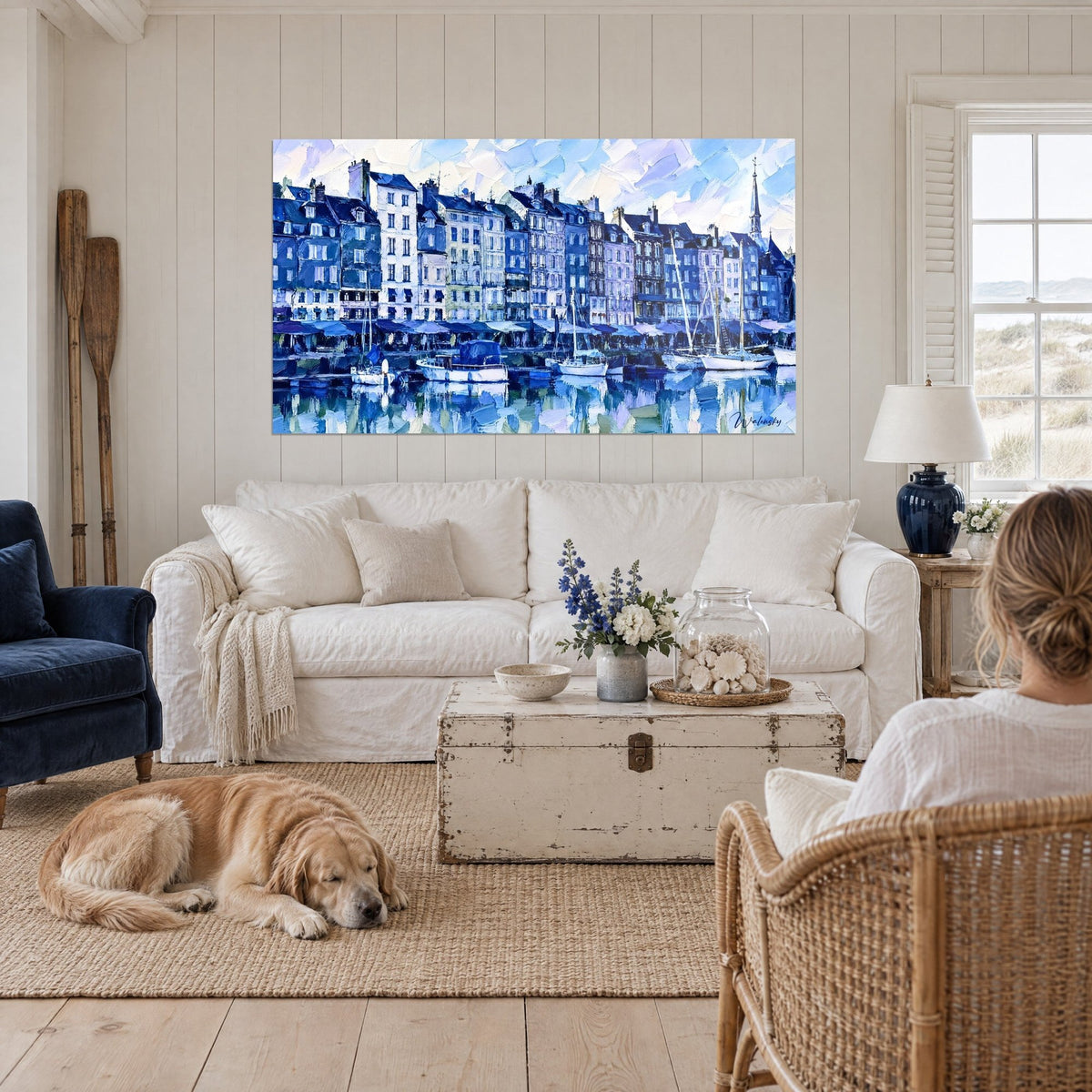 Wall art Honfleur slate facades in blue and lavender palette-knife strokes, reflections on the water, above a sofa in a bright living room