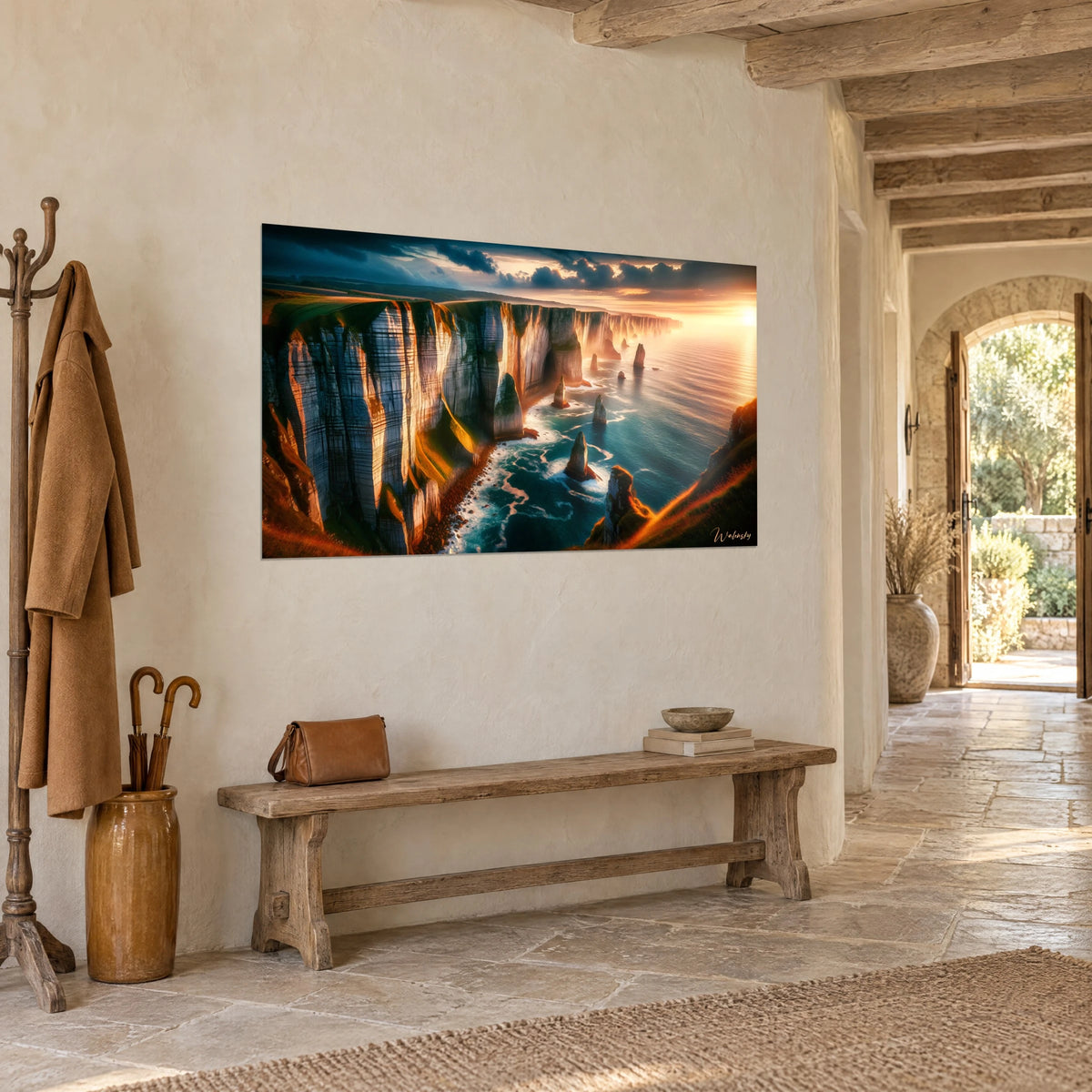 Wall art white rock aqueduct and orange grass overlooking the blue ocean, hung beside a pale stone arch