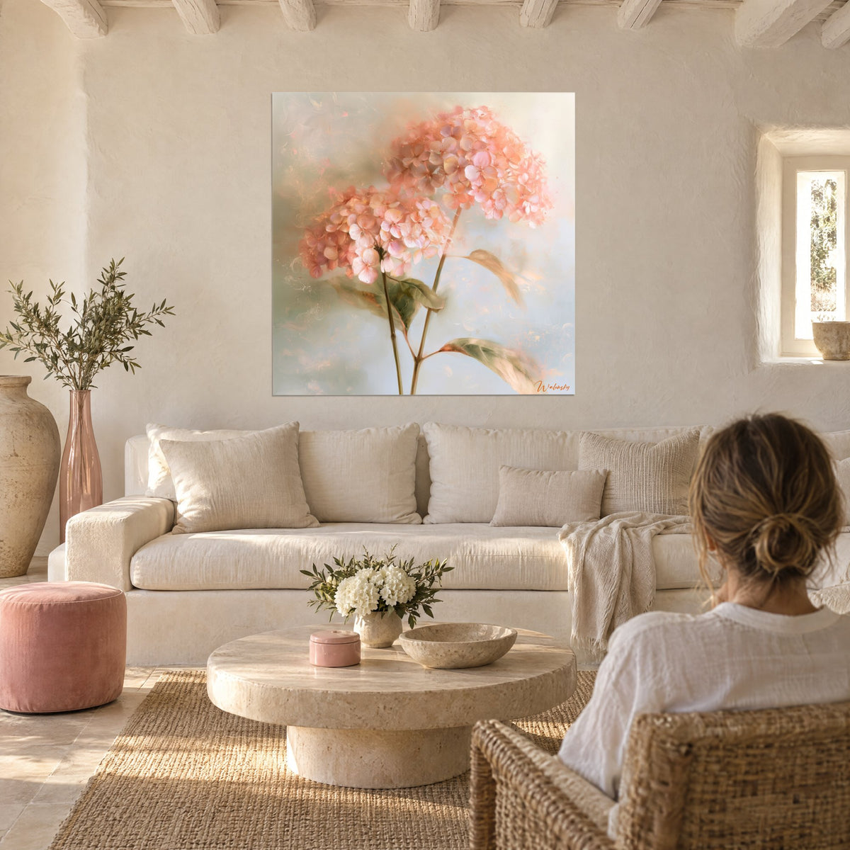Wall art hydrangea double umbel of coral and powdery pink petals on misty sage background, above a sofa in a bright living room
