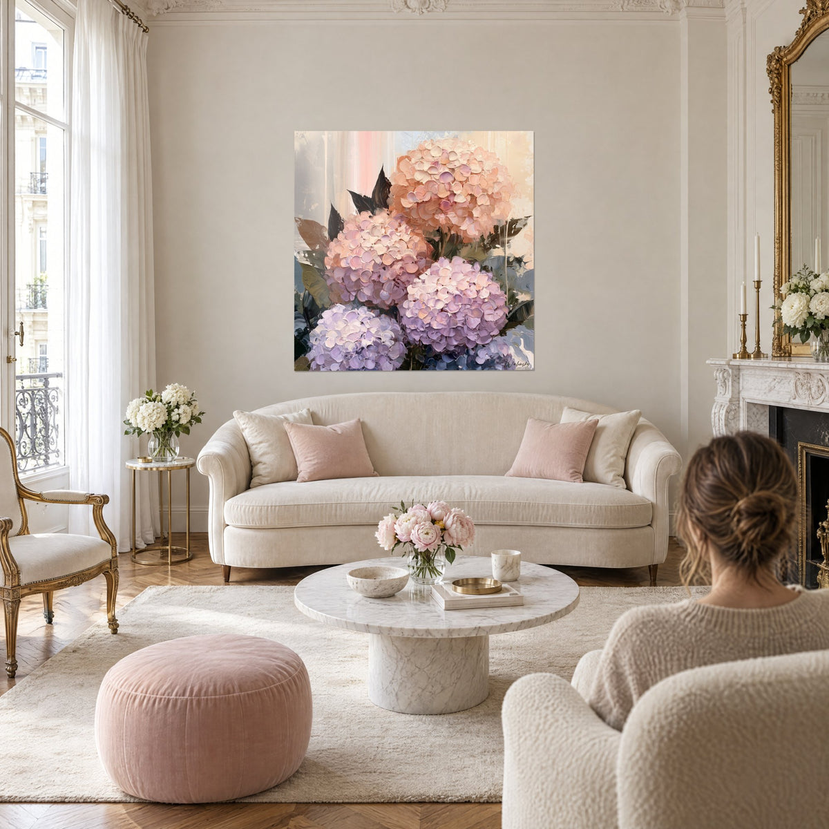 Wall art with mauve and peach hydrangeas in thick textured brushstrokes, dark brown leaves, above a sofa in a bright living room