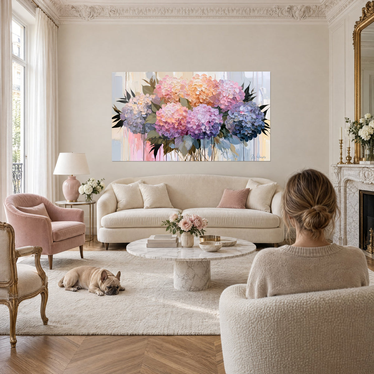 Wall art hydrangea bouquet in peach and lavender, pink drips on a beige background, above a sofa in a bright living room