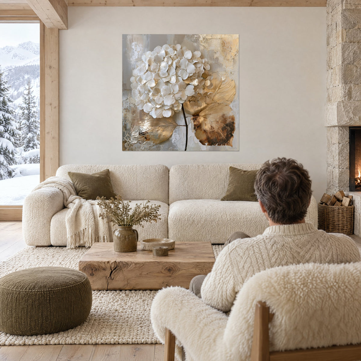 Wall art hydrangea with ivory petals on cracked gold leaves, pearl grey background, above a sofa in a bright living room