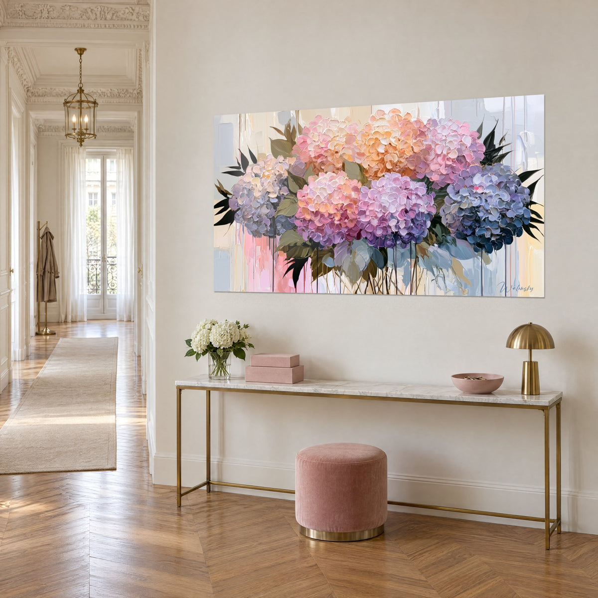 Wall art hydrangea spray in salmon pink and slate blue, olive green leaves, on a gilded console in a Parisian hallway