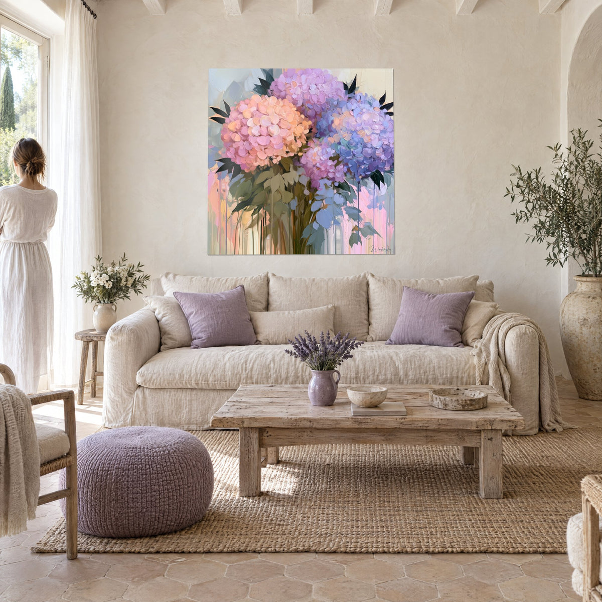 Wall art hydrangea bouquet in salmon pink and lavender blue, pastel drips, above a sofa in a bright living room
