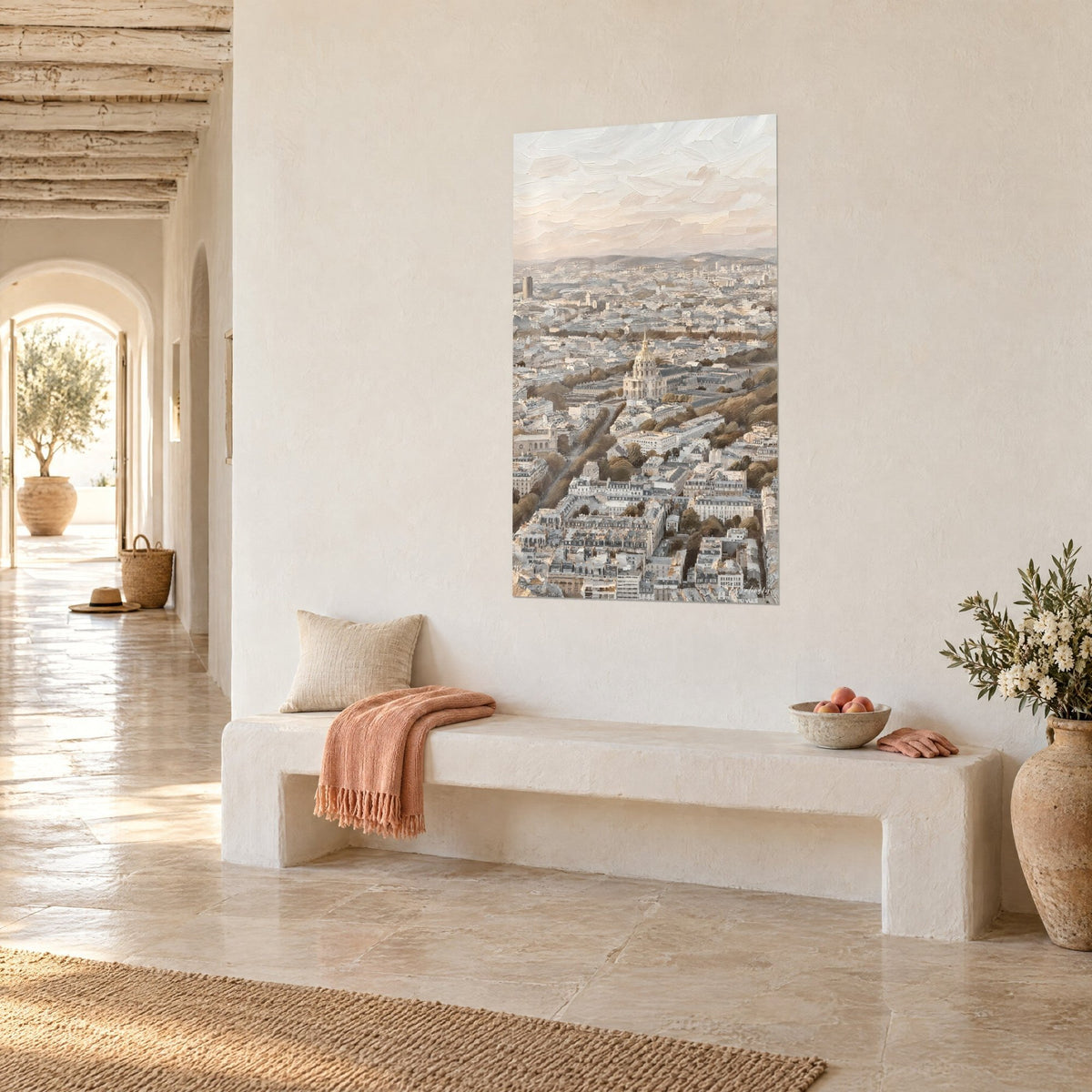 Wall art aerial panorama of Paris in ochre and cream tones, avenues lined with russet trees, on a white wall above a stone bench