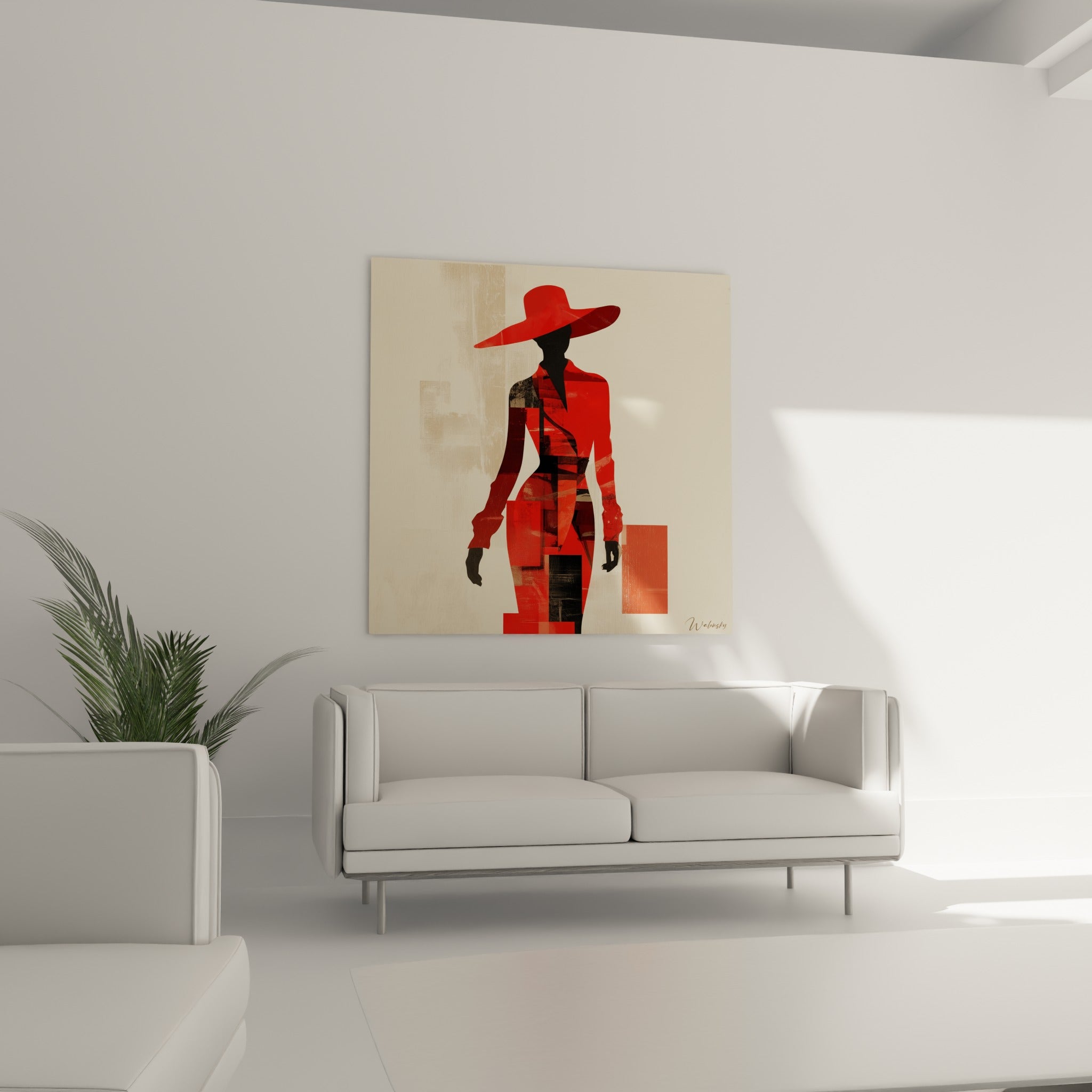 Figure élégante aux blocs rouges et noirs, fond sable, suspendue au-dessus d'un canapé dans un salon lumineux