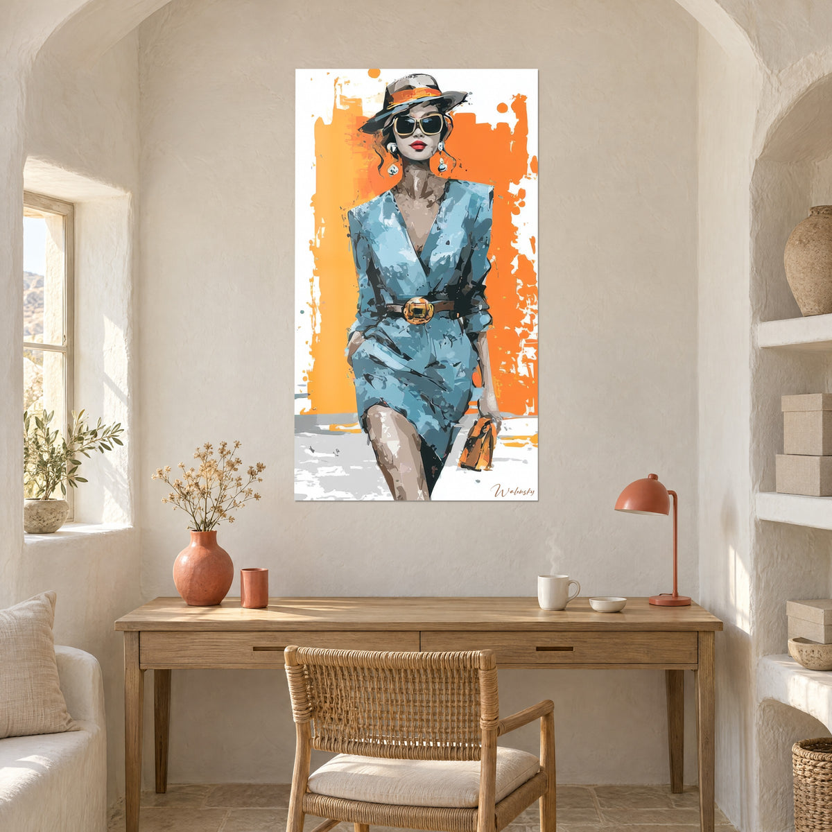Wall art of a Parisian woman in a grey hat and pearl earrings, blue dress, orange highlights, above a light wood desk