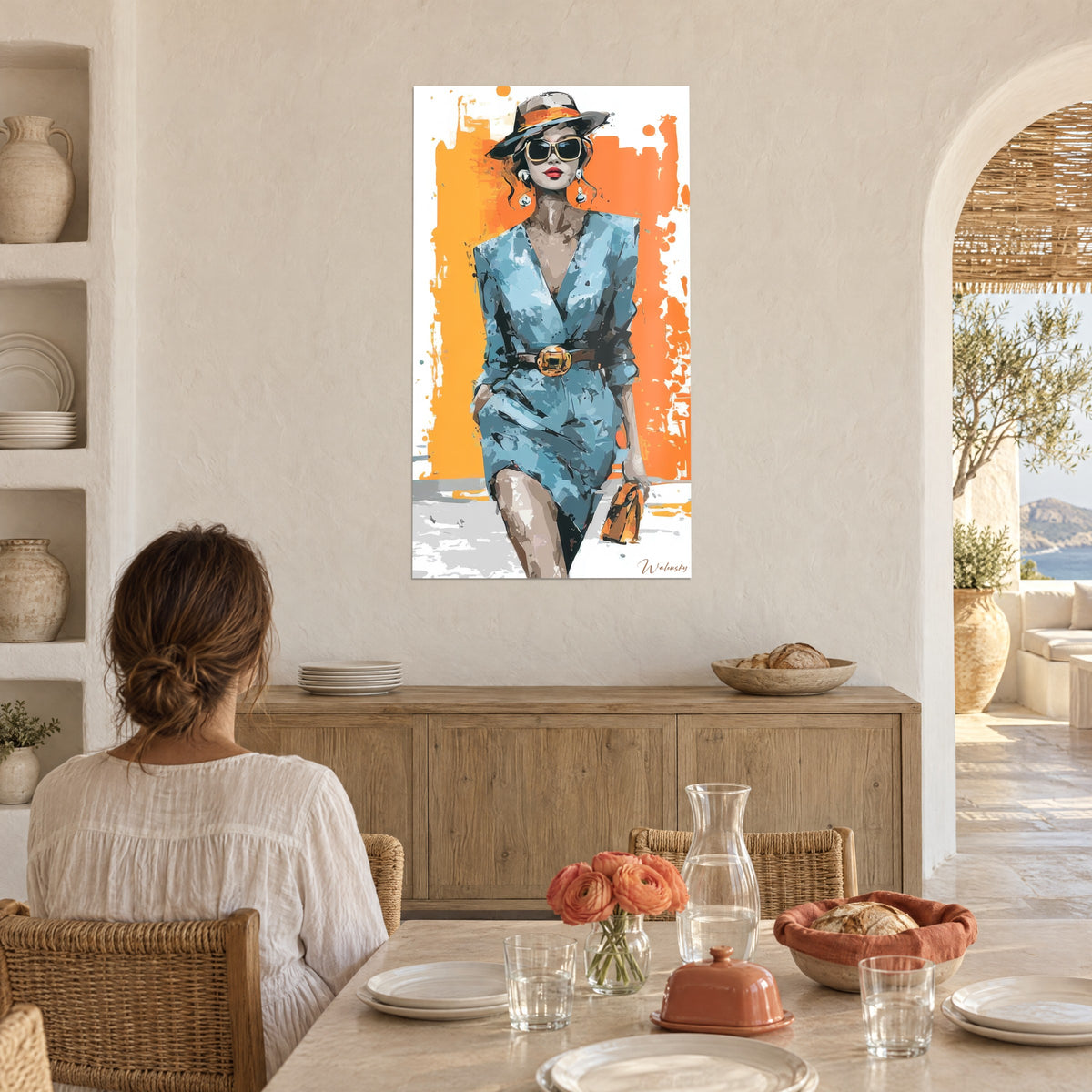 Wall art of a fashion portrait with painterly brushstrokes, blue suit and gold belt on orange background, white wall, dining room