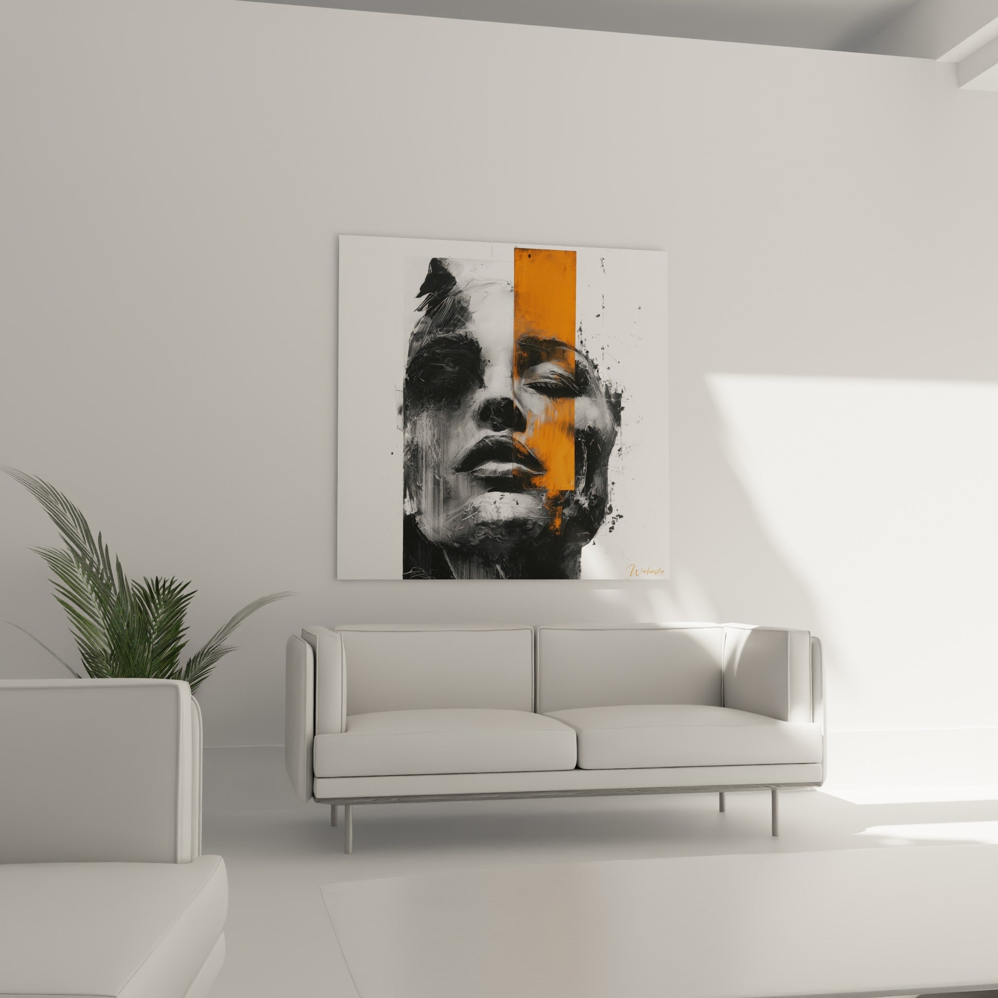 Visage graphique noir et orange placé au-dessus d'un canapé dans un salon lumineux