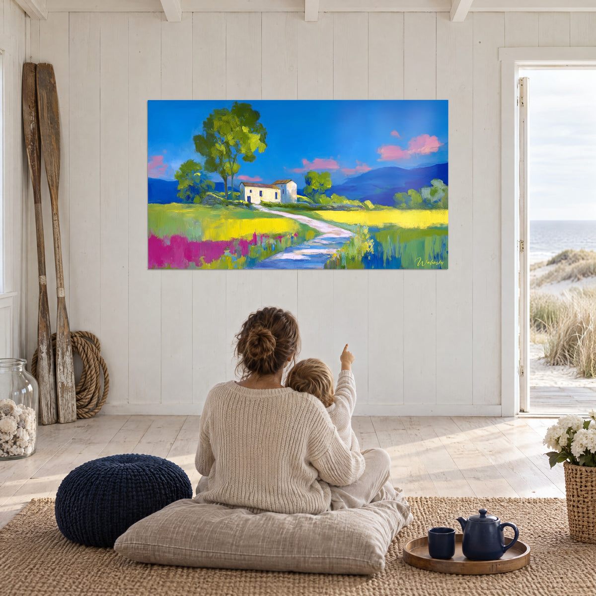 Schilderij lichtend pad naar een wit huis, groene bomen en roze wolken, in een woonkamer met zeezicht