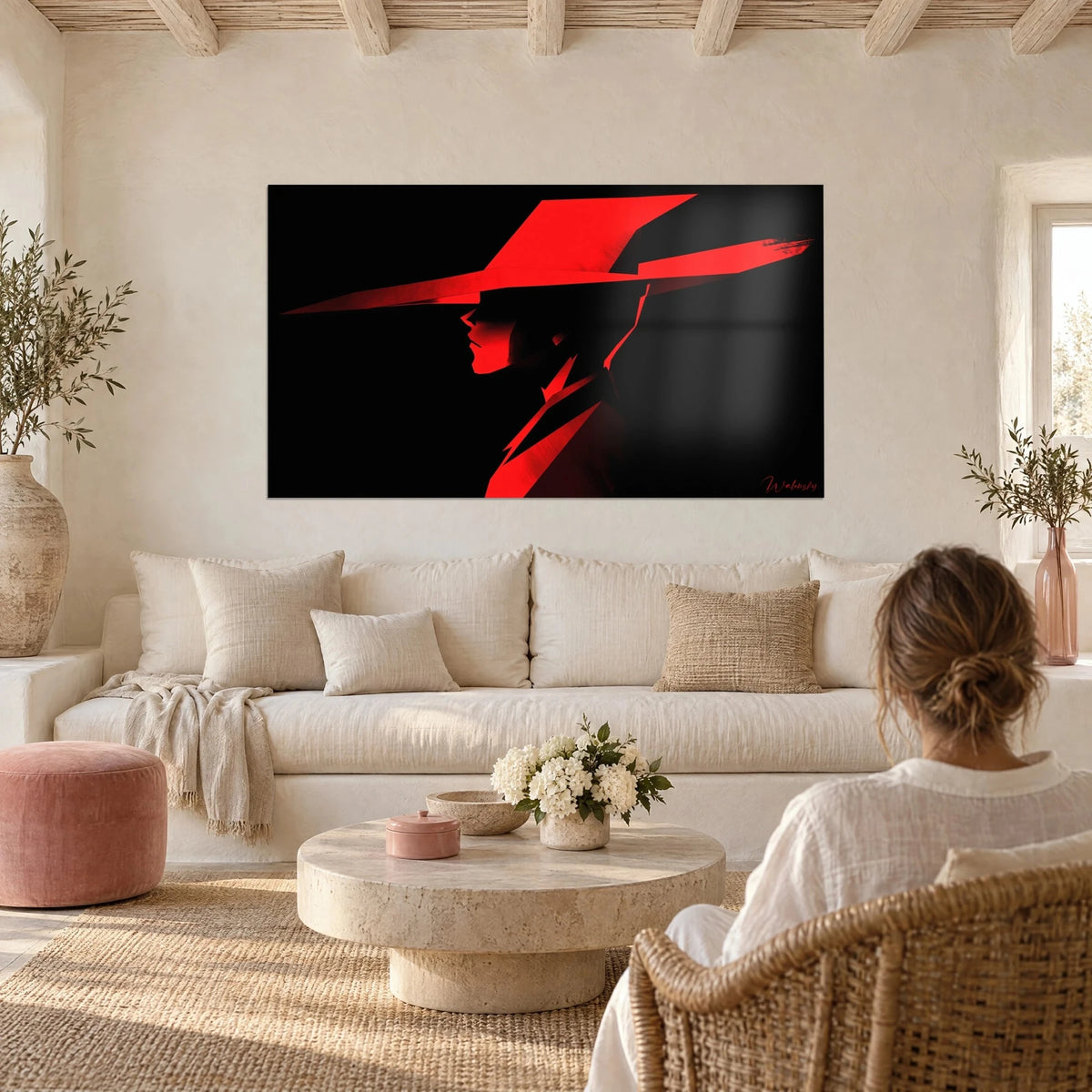 Tableau silhouette de profil au chapeau rouge vif à large bord sur fond noir, couple de dos au-dessus d'un canapé dans un salon lumineux