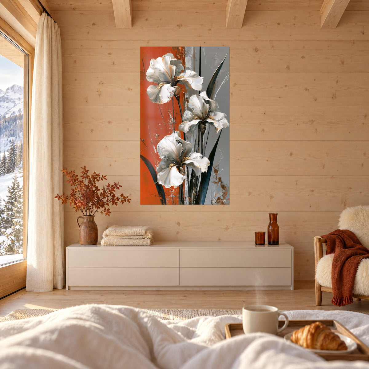Quadro fiori di iris color crema, stami dorati e lame nere su arancio e grigio, sopra un letto in una camera luminosa