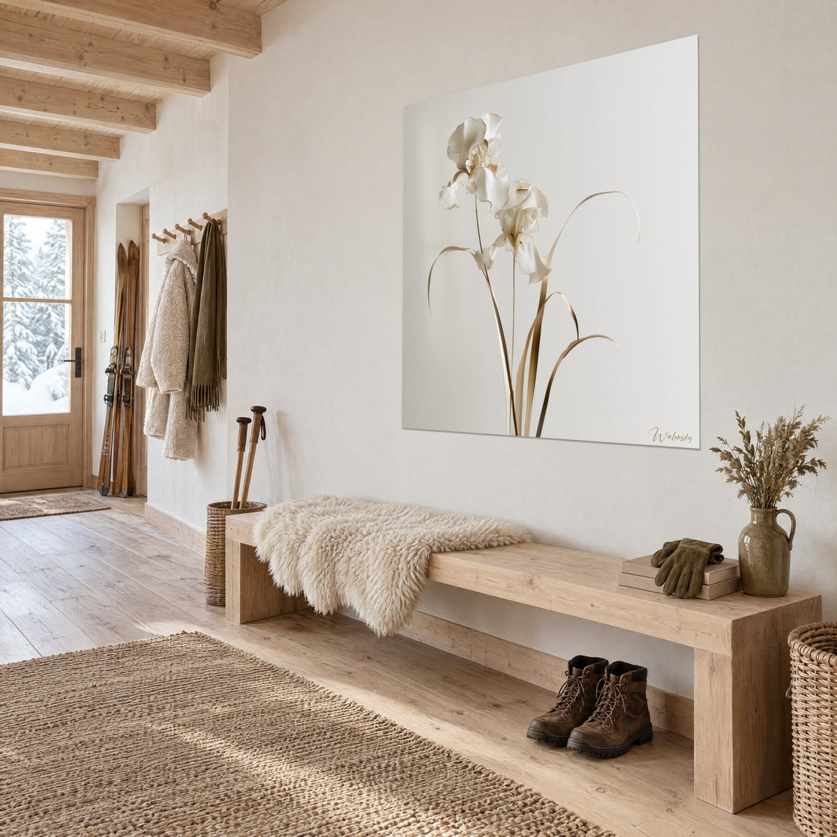 Wall art of an ivory iris and copper-toned leaves arranged in an arc, hung at a three-quarter angle above an oak bench in an entryway