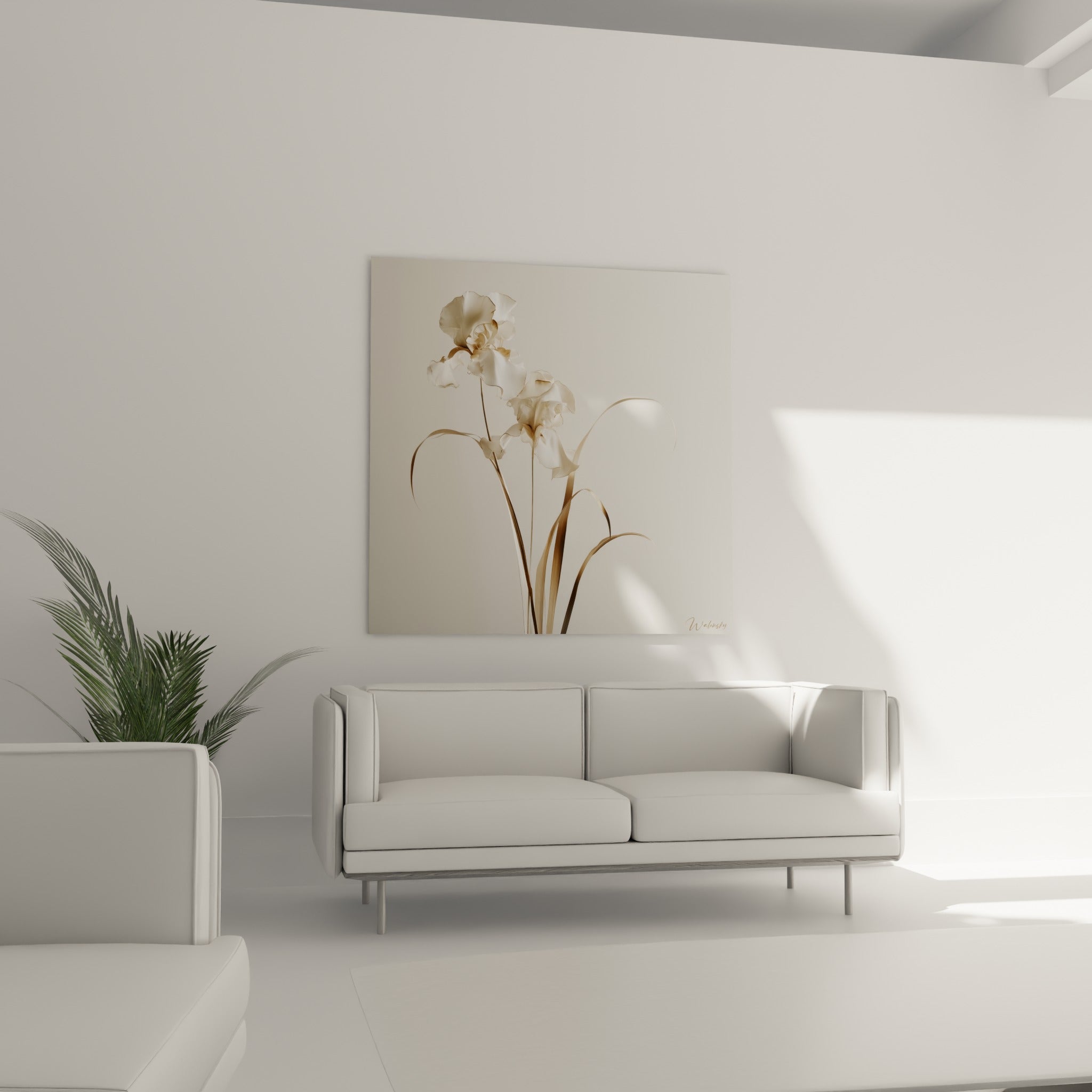 Tige d'iris ivoire et bronze aux courbes gracieuses, placée au-dessus d'un canapé dans un salon lumineux