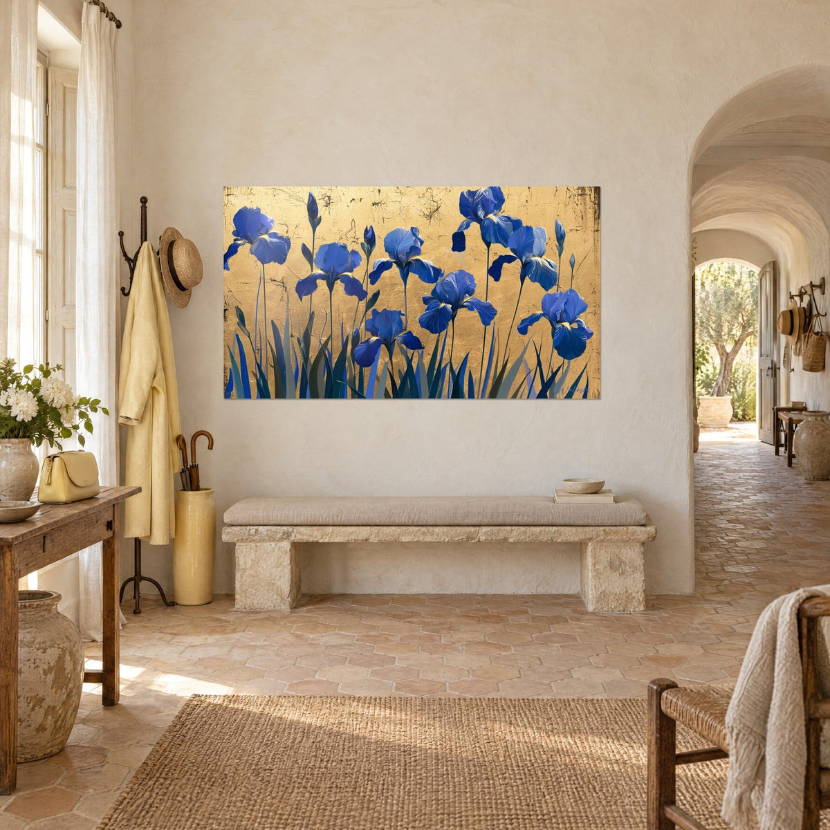 Wall art of indigo iris blooms with sage-green stems on cracked gold background, three-quarter view in a farmhouse, vaulted hallway
