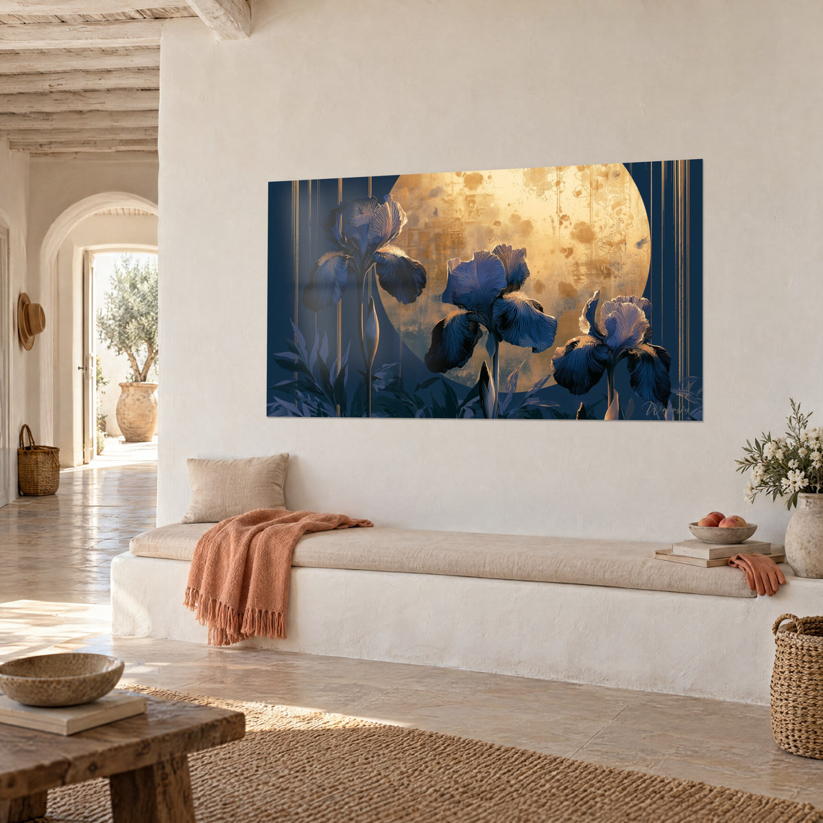 Wall art of three indigo iris flowers with veined petals in front of a golden, patinated moon disc, white wall of a Mediterranean house