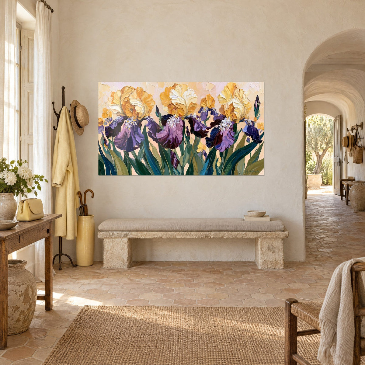 Wall art trio of saffron and plum flowers in thick impasto on pale pink background, three-quarter view in a Provençal farmhouse