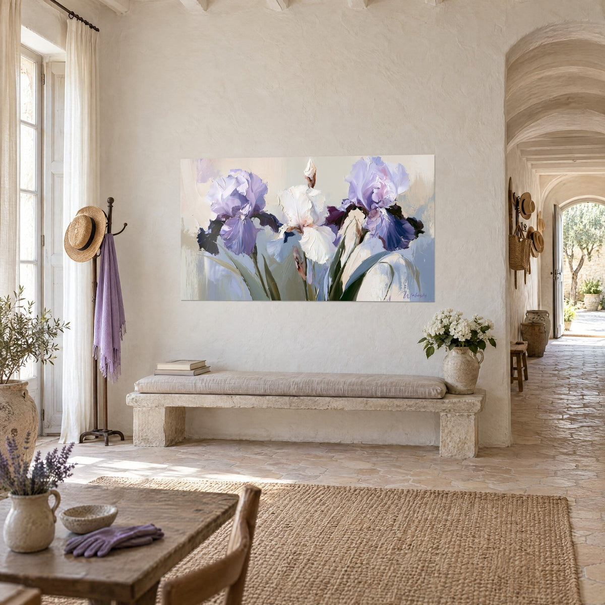 Wall art bouquet of three iris flowers, lilac and ivory, deep plum-dark petals, three-quarter view on a wall of a Provençal farmhouse