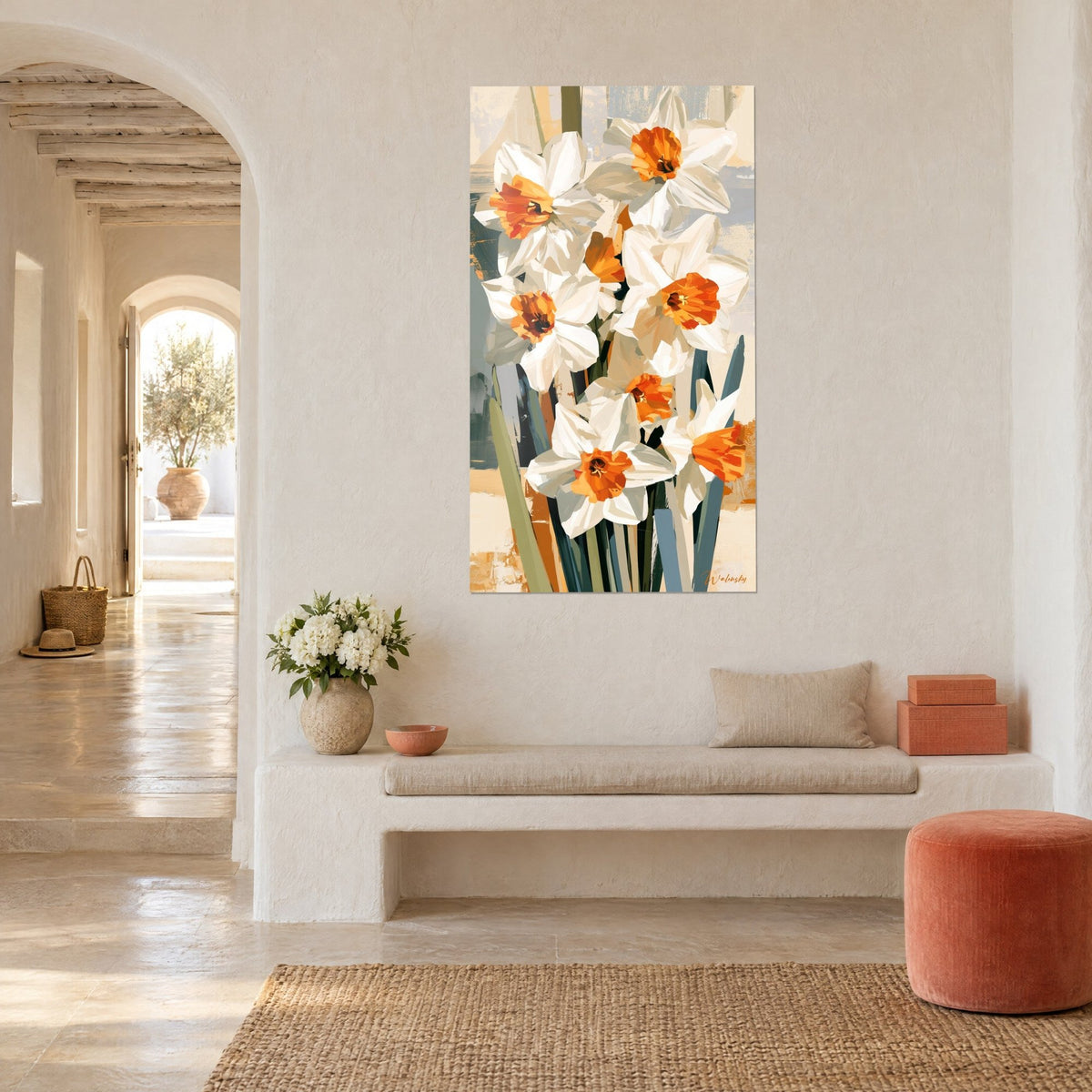 Wall art daffodils with ivory petals and orange trumpets on a beige background, facing a white bench and a coral pouf