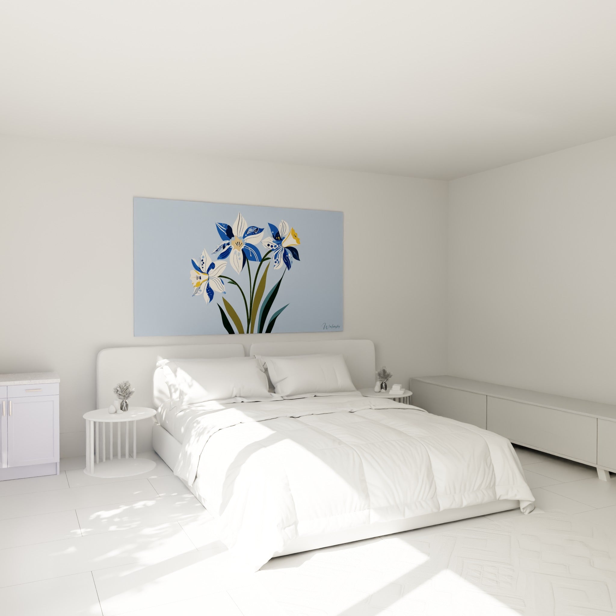 Trois jonquilles bleu marine et blanc ivoire au-dessus d'un lit dans une chambre claire