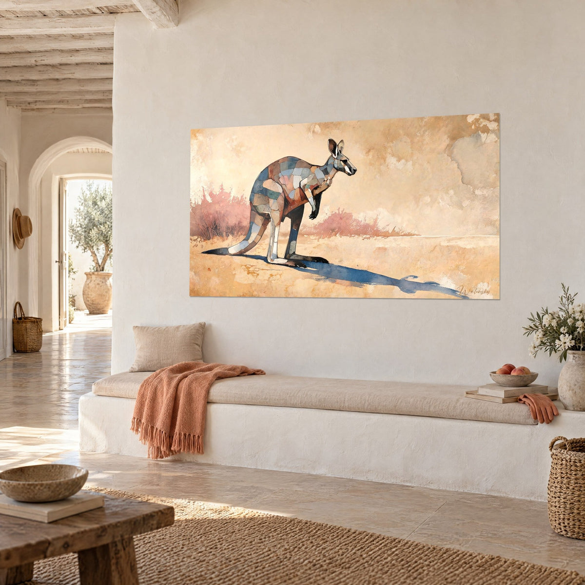Wall art marsupial in a mosaic of ochre and grey tones, powdered pink bushes, seen three-quarter view in a Mediterranean house