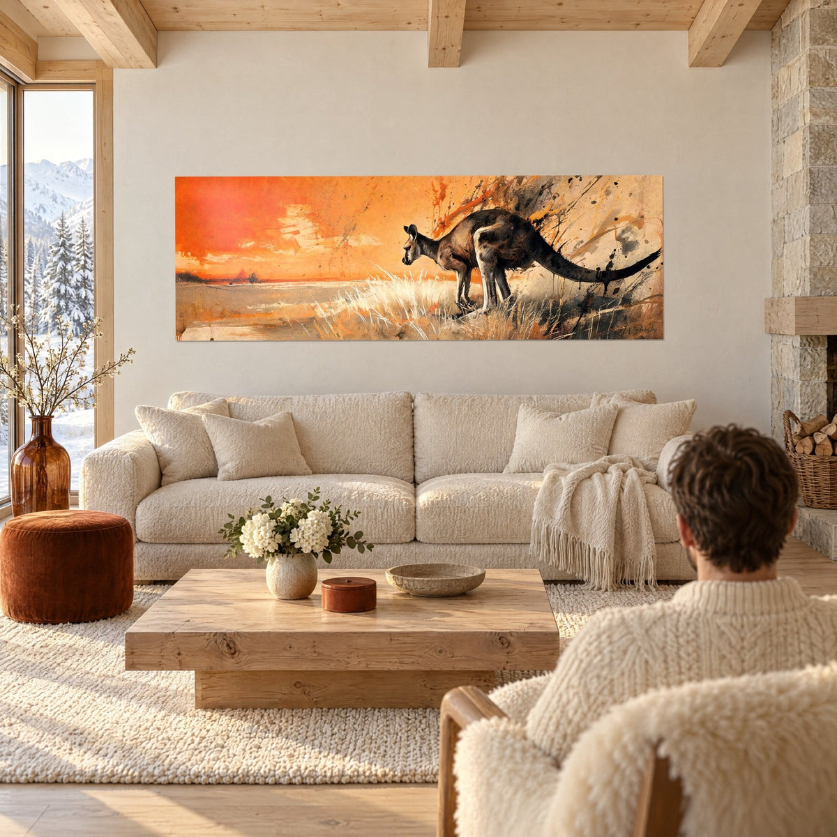 Schilderij bruine kangoeroe gebogen over de horizon, oranje lucht en gouden gras, een koppel van achteren boven een bank in een lichte woonkamer