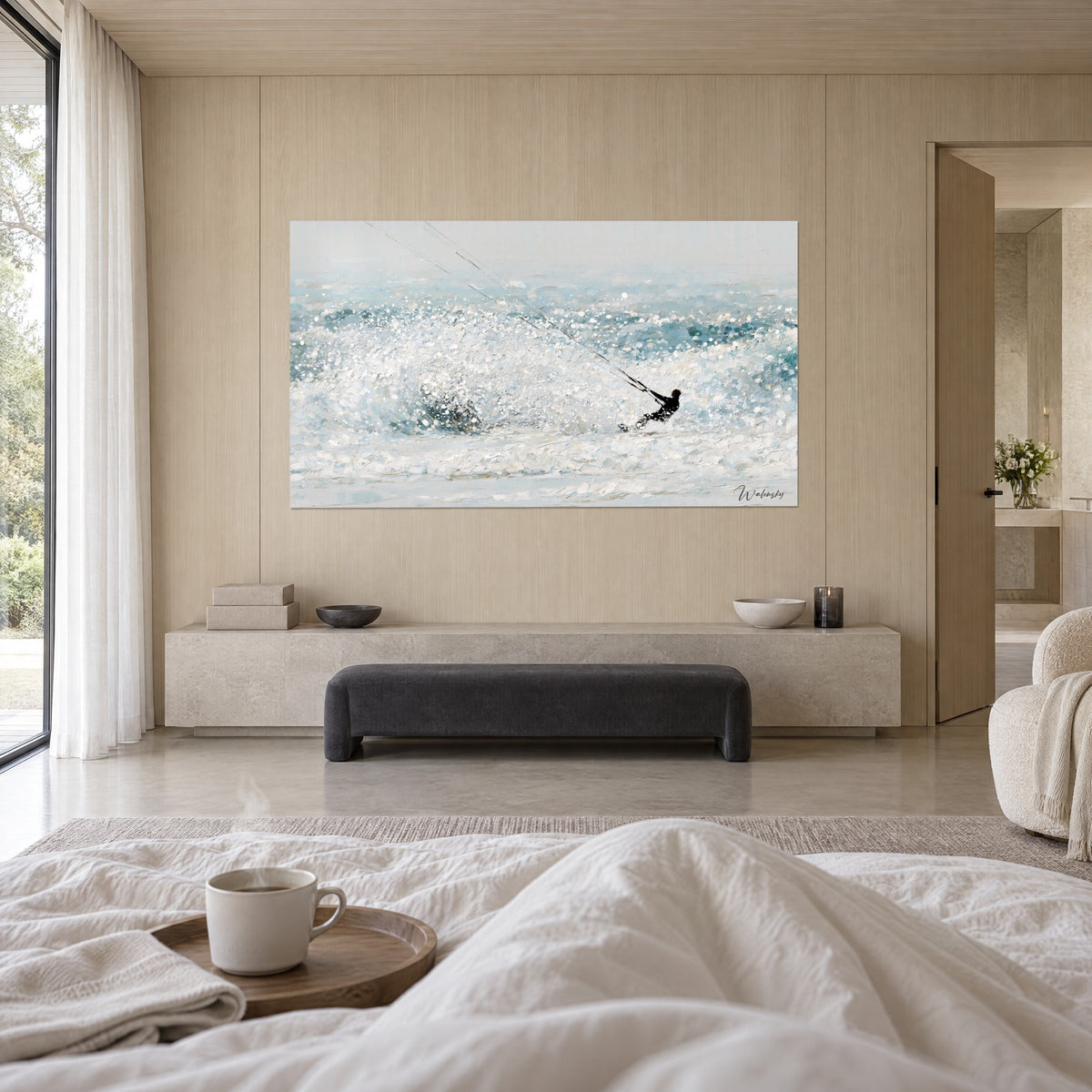 Wall art kiteboard slicing through a sea of white and blue-grey foam, black rider leaning over his lines, above a bed in a bright bedroom