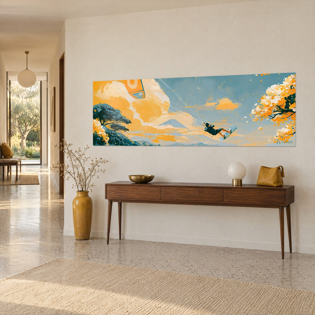 Wall art dark silhouette gliding over its pale board, orange cherry blossoms and grey-blue sky, placed on a wooden console