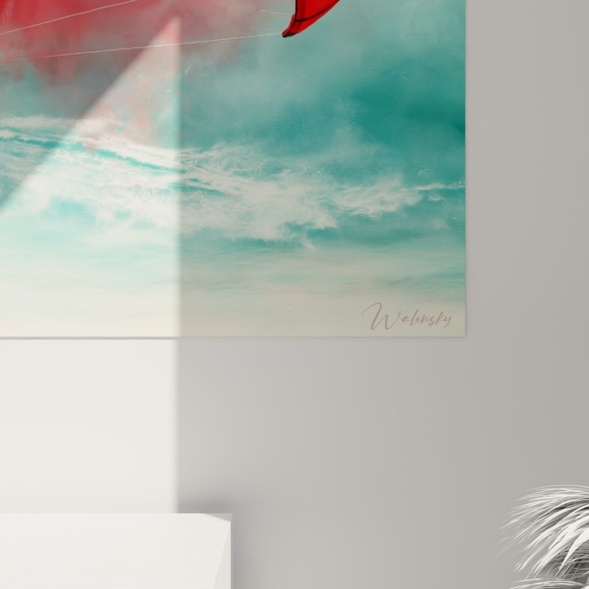 Empâtements rouges et touches turquoise se mêlant en gros plan, grain pictural du tableau kite surf accroché au mur