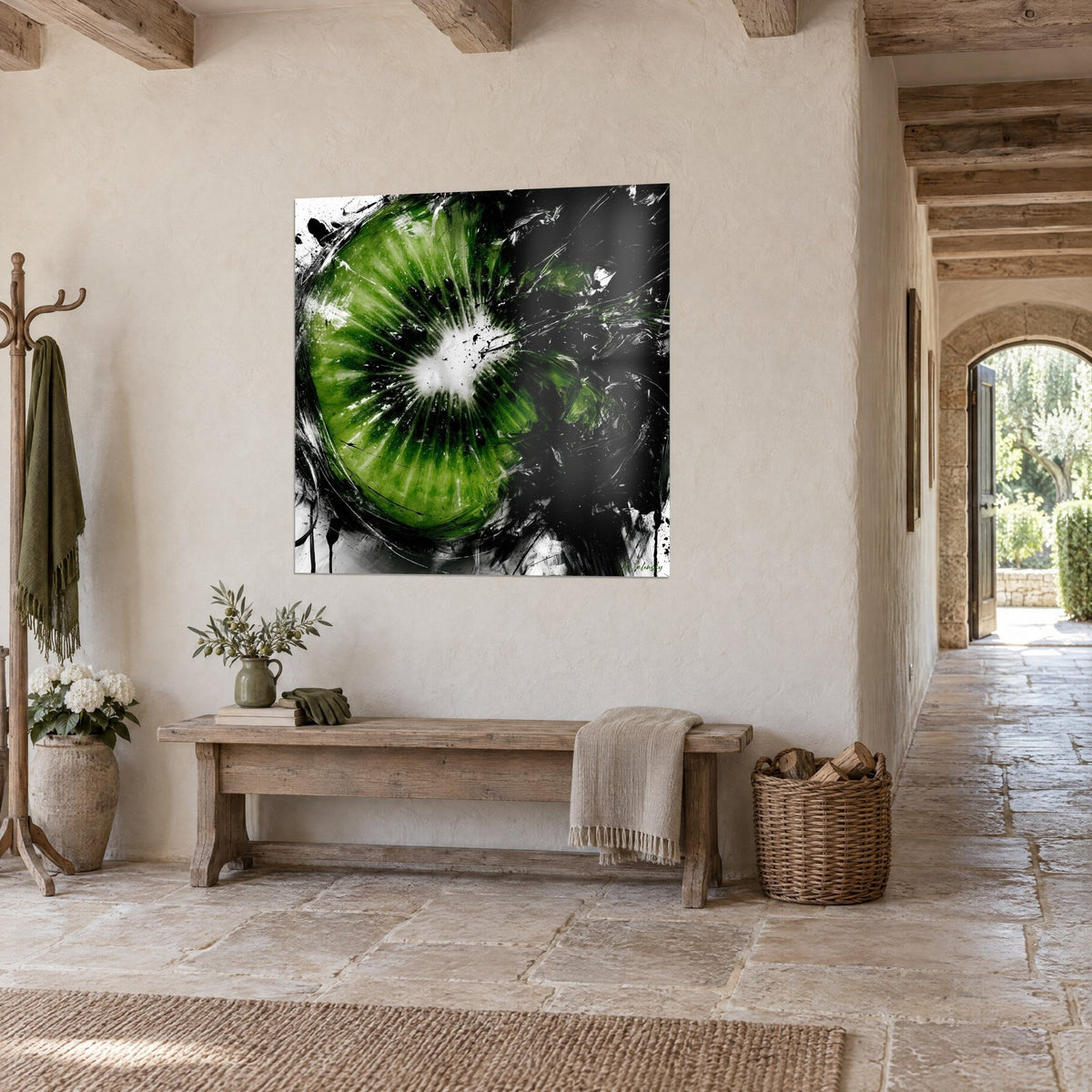 Cuadro de fruta exótica cortada con semillas negras en radios, verde manzana y blanco, colgado en un pasillo de piedra visto de tres cuartos