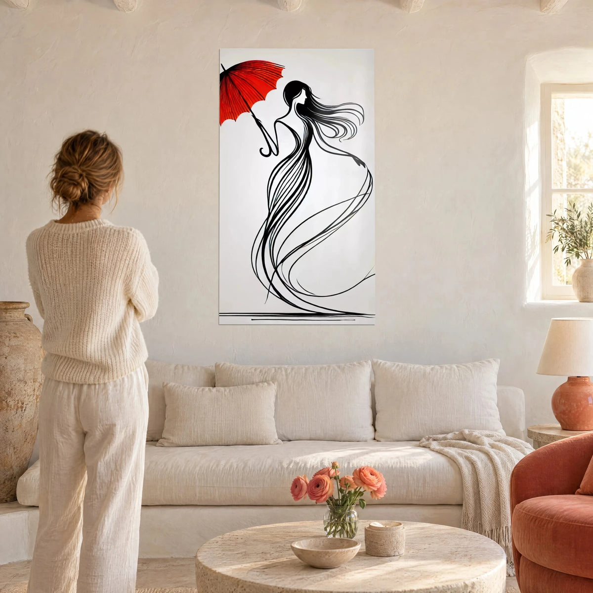 Gemälde schlanke weibliche Silhouette mit einem roten Sonnenschirm, fließende schwarze Linien, über einem Sofa in einem hellen Wohnzimmer