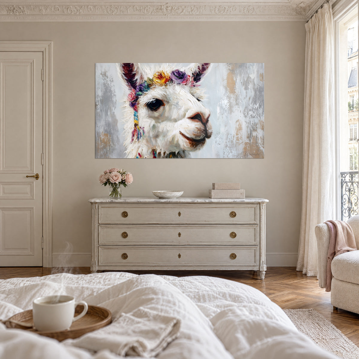 Wall art woolly ivory alpaca, pink and turquoise pompoms, pale grey background, above a bed in a bright bedroom
