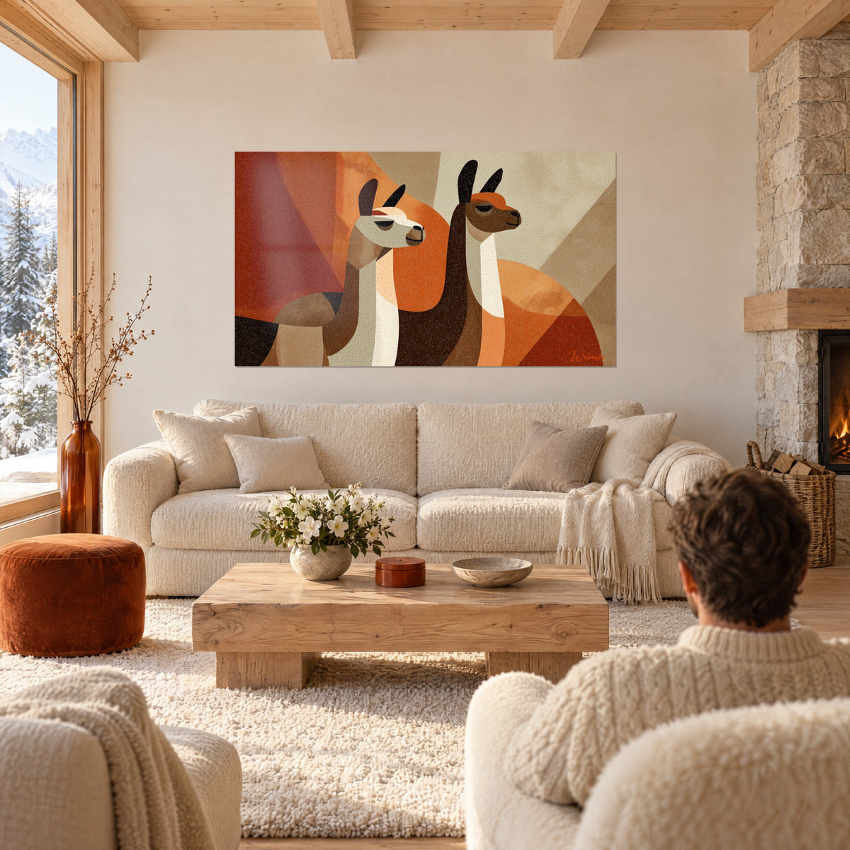 Gemälde zwei stilisierte Lamas mit braunem und cremefarbenem Fell auf orangefarbenem Hintergrund, über einem Sofa in einem hellen Wohnzimmer