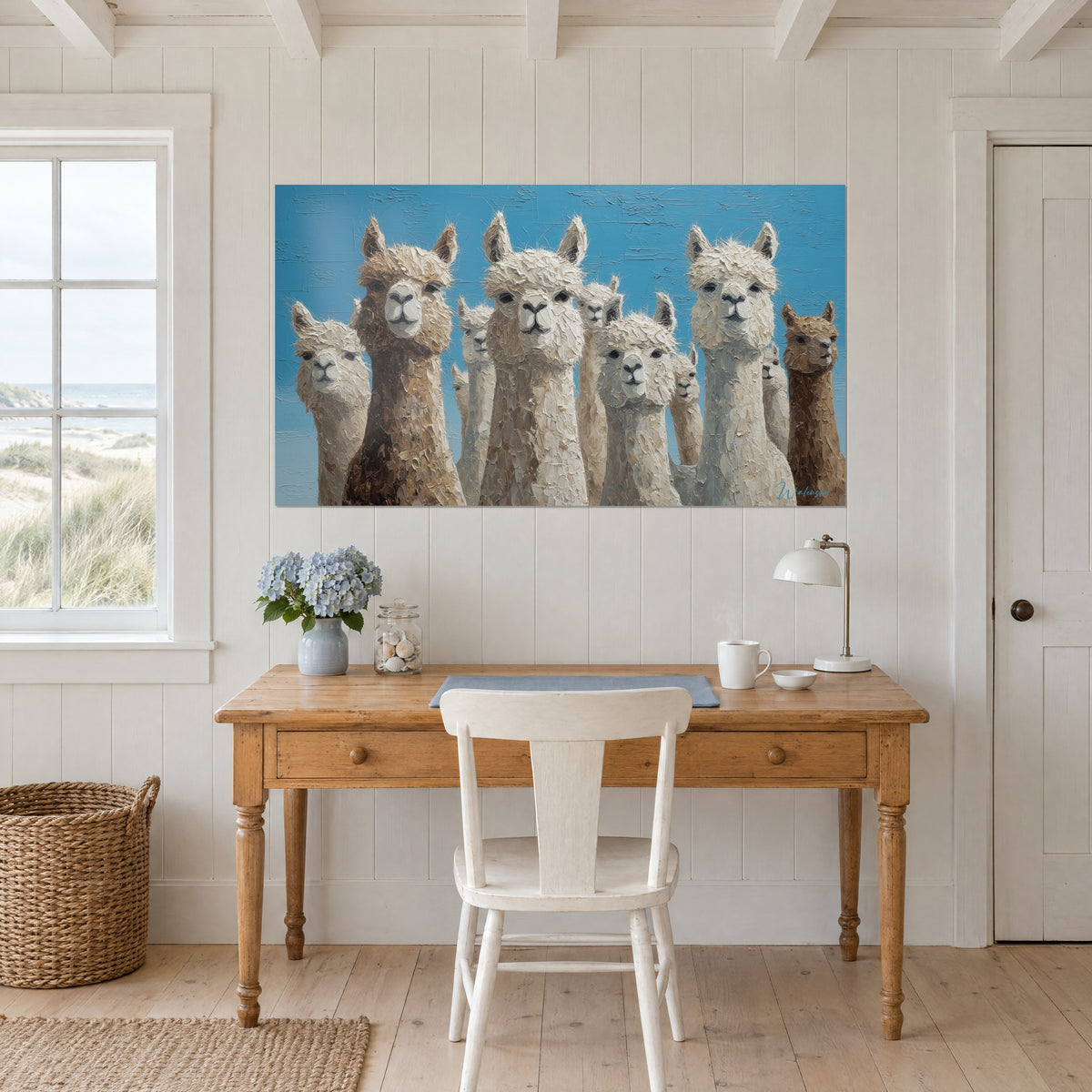 Wall art curious llamas with pricked-up ears, beige and brown impasto strokes against sky blue, above a pine desk